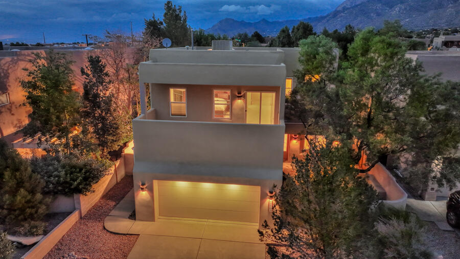 Foothills  /High Desert /Chamisa Trail  custom on L/S cul de sac lot .* 3 BR & study /loft **Sep  PBR with luxury bath ,walk in closet & view deck. Private  entertainers front courtyard with patio, bancos, mountain views-perfect for entertaining. Private back yard with patio & water fall. Inviting foyer. Open, light & bright floorplan with lots of windows & decorator color tones. Expansive great room with raised ceiling , custom fireplace, open to dining areas & kitchen . Formal dining room  raised ceiling & santa fe wall -open to great room & kitchen. Large master chef kitchen with lots of granite counters & custom cabinets, SS appliances , pantry, breakfast bar & breakfast nook- all open to  patio. 2 main floor guest BRS with ample closet space & easy bath access. Xtra long 2 car garage