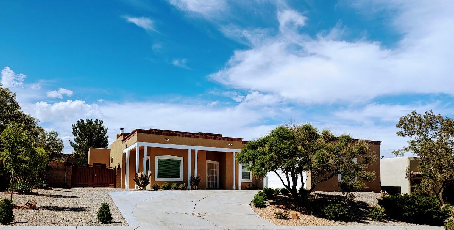 This beautiful Pueblo style house is on a corner lot and has backyard access. Located in the Watershed community and is in the school district of the new Tres Volcanes Community Collaborative school. The open floor plan in the kitchen and family room area is the perfect place to hang around with family and friends. Enjoy the beautiful Albuquerque weather relaxing in the grass area or in the covered patio. The MB bathroom has double sinks, soaking bathtub, a separate shower, and a walk-in closet. Four bedroom and 2.5 bathroom. Windows installed in 2022, water heater installed in 2023 and the water softener is included. This is a house that you would love to call HOME! Sq. ft is approximated.