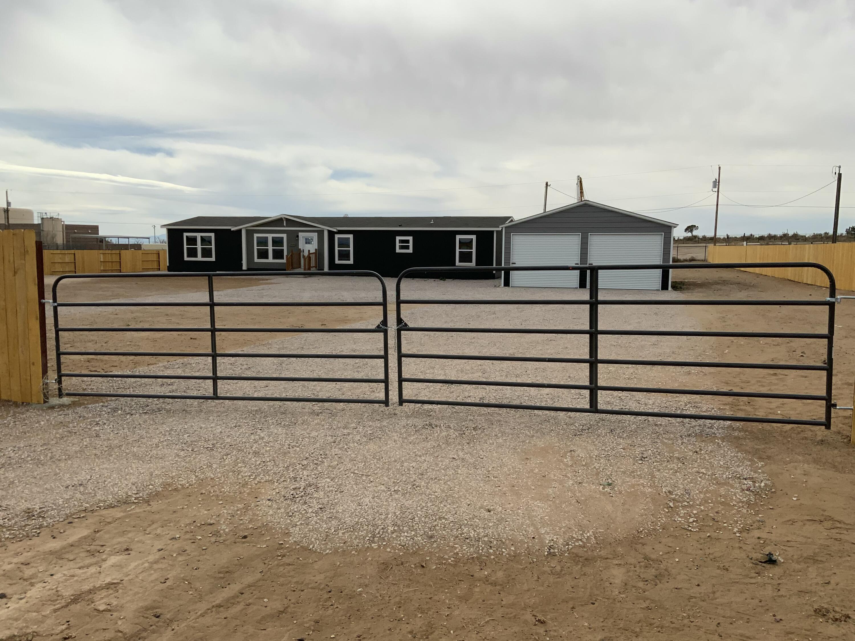 Seller offering $4,000.00 Flex Cash if under contract by 05/30/2025! This Brand New Clayton Home is close to shopping at Unser and Southern but still sits in the peace and quietness of the county. Home is in Rio Rancho School District. The is on a Permanent Foundation that qualifies for VA, FHA,Conventional, and USDA Loans. Home sits on One Acre of Land. Home comes with four bedrooms, two bath, an open concept living room, dining room, large kitchen with a large center island, second living room, plus flex area. Some of the other features Stainless Steel Appliances, Ecobee Smart Thermostat that you can operate remotely on your phone with app, Refrigerated Air. Spacious owners suite with luxury bathroom that has a long soaking tub and walk in shower.