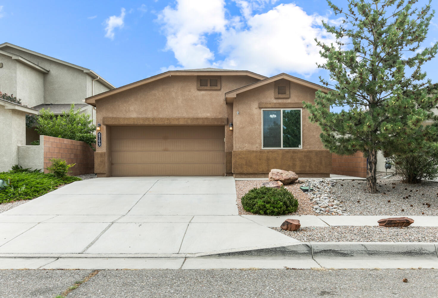 Four Bedrooms and all Spruced Up at Taos at the Trails!!  This Home is Located in an ''Opportunity Zone'' and is eligible for below market financing with low down payments too!  Ask your Broker for more details. Come and see this 4 BR home in the desirable Taos at the Trails Subdivision.  Great Schools and a Convenient Westside Location make this Home a Rare Find!   New Paint, New Carpet and a Spic & Span Cleaning make this home shine along with the Open DR Horton ''Millwood'' Floor Plan.  Original Built to Build Green NM Silver Standards, this home also generates its own electricity from a 5.4 KW Solar Panel Array.  This is a great home that deserves to be seen before you make a buying decision. Schedule your Showing Today! Don't forget about our special mortgage financing interest rate!!