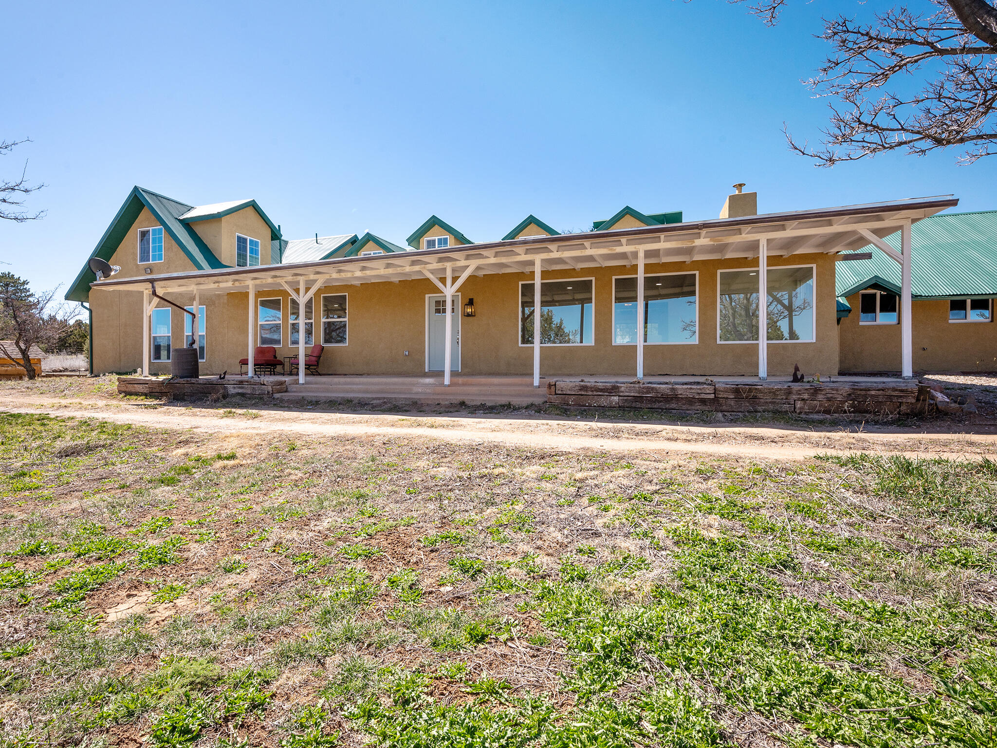 Motivated Seller!  Make an offer!    Room to roam for your family in this lovely two-story Sandia Park home with 3 plus acres, four bedrooms and three living areas.   Virtually everything has been recently remodeled.  Majestic mountain views and fenced pasture area and stable for horses.  You'll feel you're in the country, yet you are just minutes to Cedar Crest and Sandia Park restaurants, shopping, schools and golf courses.  And you can be in Albuquerque in just 20 minutes via I-40.