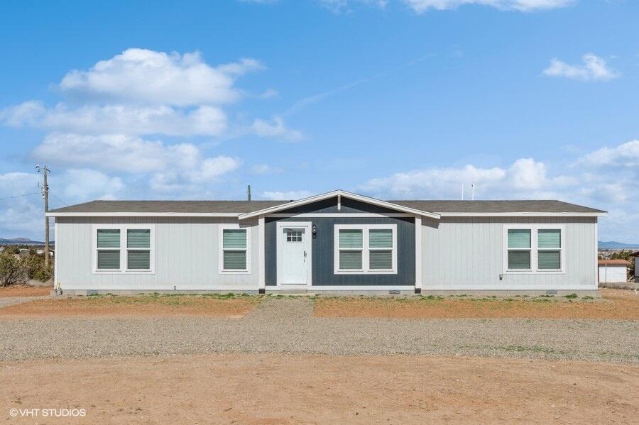 Come see this newly constructed manufactured home in Edgewood! The primary bedroom is separate from the rest of the bedrooms and features dual sinks, a large tub for a relaxing soak + a walk in shower. Open kitchen with an island and numerous storage spaces, as well as 4 large windows to let the natural light in. Vinyl flooring throughout (no carpet!). Views of the mountains from the backyard. New septic system (installed in 2023). Less than 2 miles to shopping and dining. Don't miss this one!