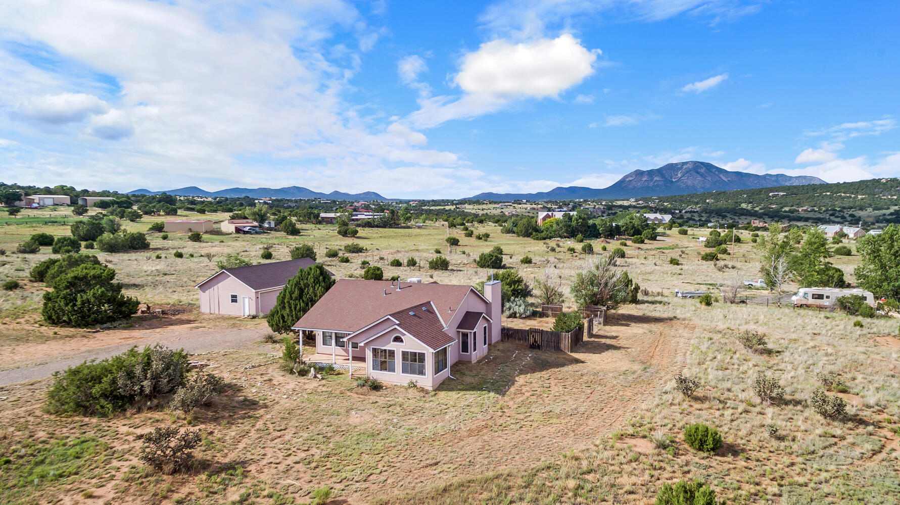 Wonderful Edgewood area home with abundant possibilities. Features an open & bright floor-plan with abundant windows, great views.  Stunning 3.7 acre lot offers a combination of trees and meadow-great for horses!  Detached 4 Car garage, approximately 975 SF.  Easy commute to ABQ and Edgewood conveniences. Home is on Entranosa Water Co-op. Home, new septic tank to be installed.  Needs a little TLC, bring your imagination and a little elbow grease and create your dream home!