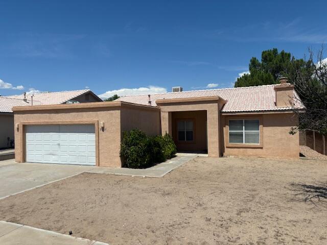 This single story home offers a spacious open floor plan!  Freshly painted interior and new flooring in most areas.  This home offers a concrete tile roof and a large back yard with a ton of possibilities.  The oversized garage has a painted floor and plenty of storage space. Convenient to shopping, schools and I-40.  This home is fresh and ready for new owners!