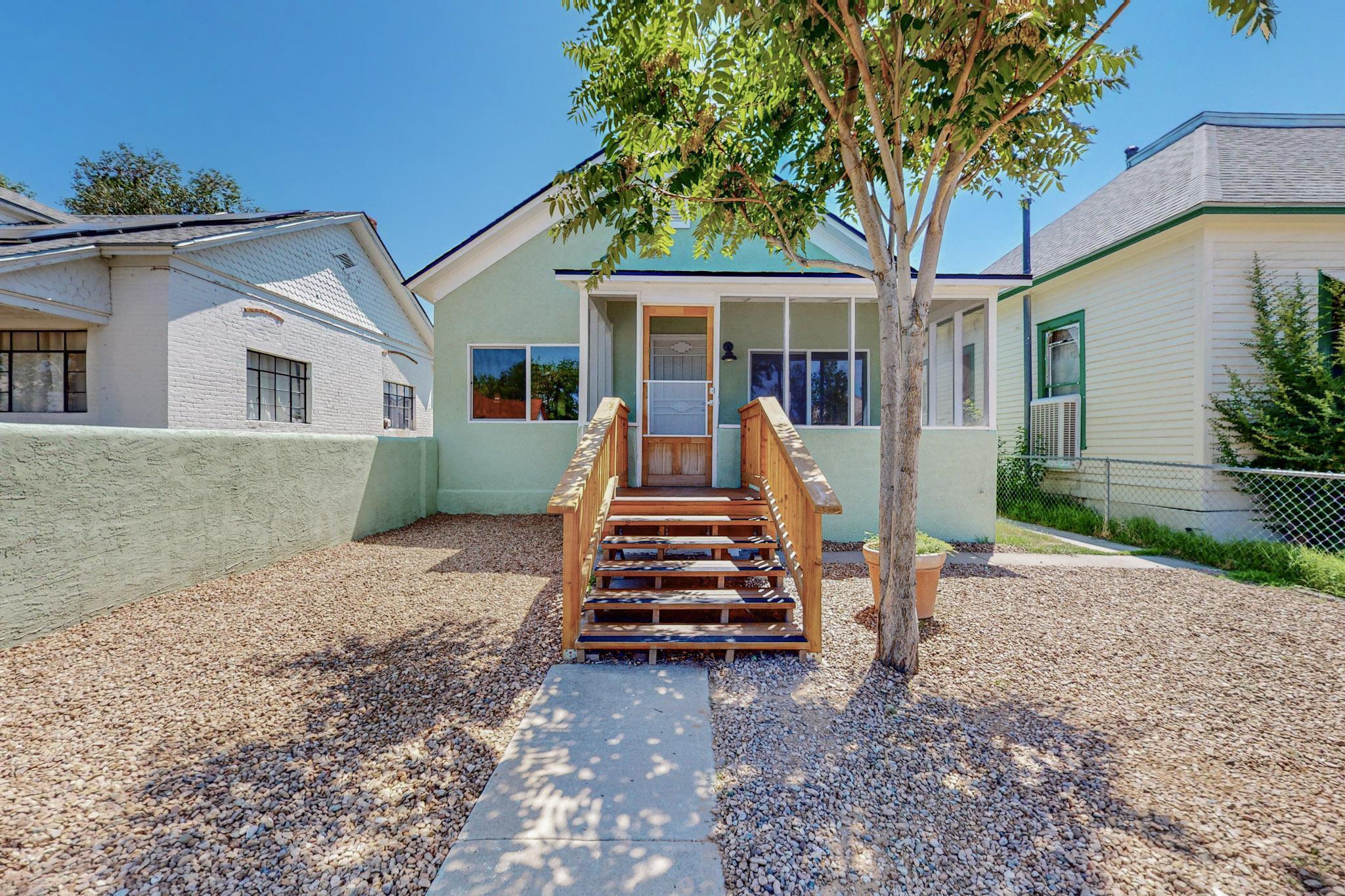 Welcome to Edith Blvd's newest addition to the block, a charming 2-bedroom, 1-bath home in Historic Huning Highlands near downtown Albuquerque. This beautifully updated residence features new refrigerated air/heat system, roof, windows, luxury vinyl tile throughout and a beautifully modernized kitchen and bathroom. Edith offers so much natural light throughout the home it glows. Enjoy the classic elegance of a steel clawfoot tub with gooseneck shower. The property includes a 214 square foot detached workshop and a private screened front porch. Ideally located near popular restaurants, yoga studios, hospitals, and downtown entertainment, with quick access to I-25 for easy commutes to UNM and CNM. Don't miss this perfect blend of historic charm and modern convenience. Great Airbnb potential