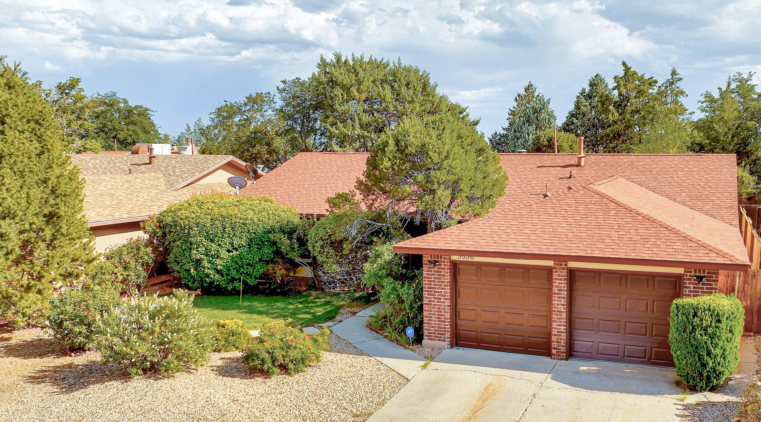 Welcome to your future home, where lasting memories await. This charming residence features a free-flowing floor plan, including two inviting living areas and a beautifully refreshed kitchen. New flooring throughout adds a fresh touch, while the  updated bathroom provides modern comfort. The backyard is an entertainer's dream, showcasing stunning landscaping perfect for gatherings and relaxation. Discover the perfect blend of warmth and functionality in this delightful home.Updated roof, new flooring, remodeled hallway bathroom, refreshed primary bathroom, and landscaped backyard.