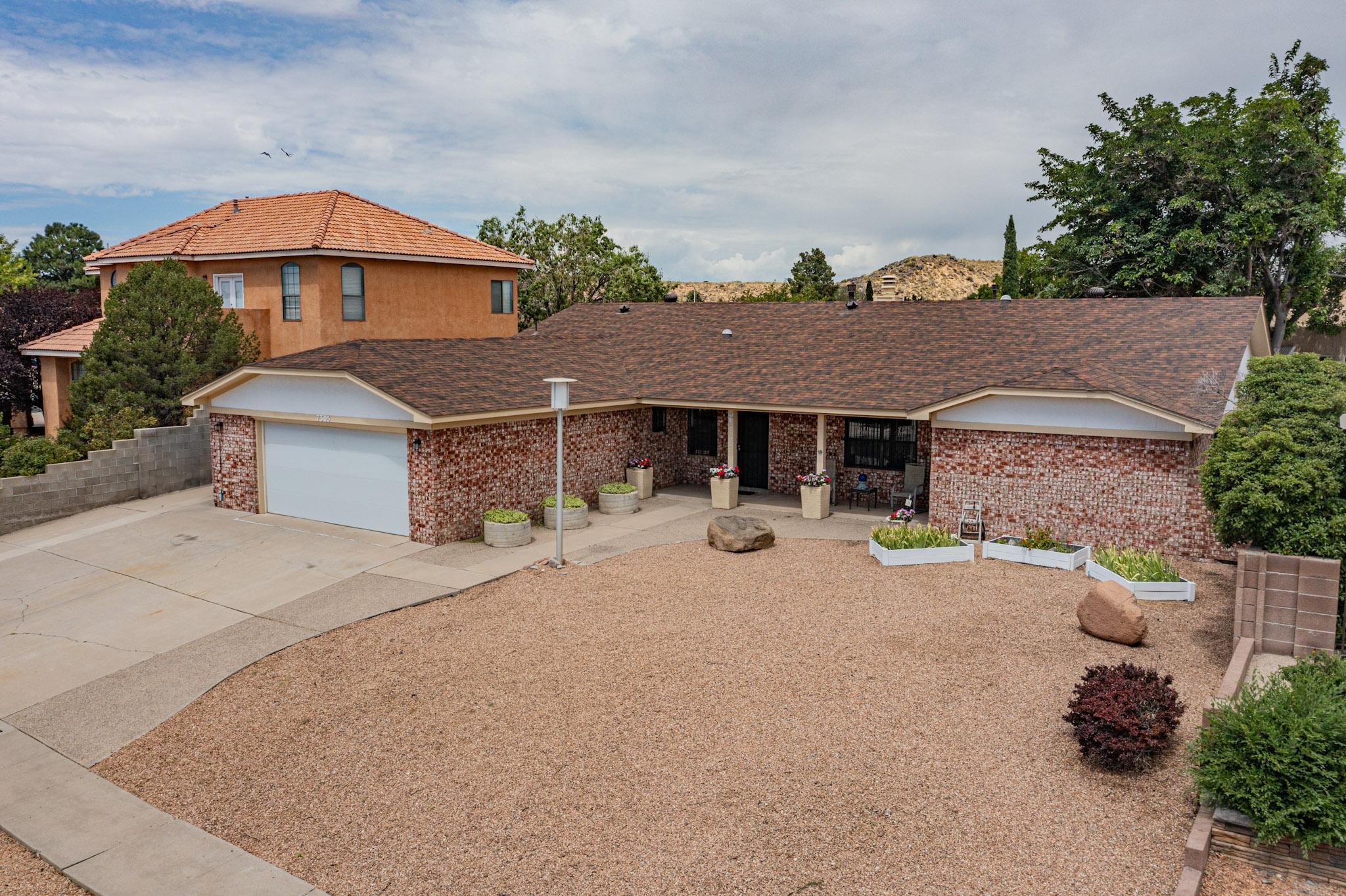 Welcome to this all-brick home in a well-established Northwest neighborhood, offering comfort and style in an open floor plan. Featuring 3 bedrooms and 2 full baths, this residence showcases new laminate flooring throughout--no carpet anywhere! Freshly painted with refinished and textured walls, the updated kitchen boasts refinished cabinets, a new large sink, faucet, dishwasher, disposal, and a spacious pantry and laundry room. Enjoy the benefits of a 10-year-old shingled roof and combo AC/furnace. The large enclosed patio opens to a backyard that's ready for your personal touch. Great location in a lovely neighborhood!