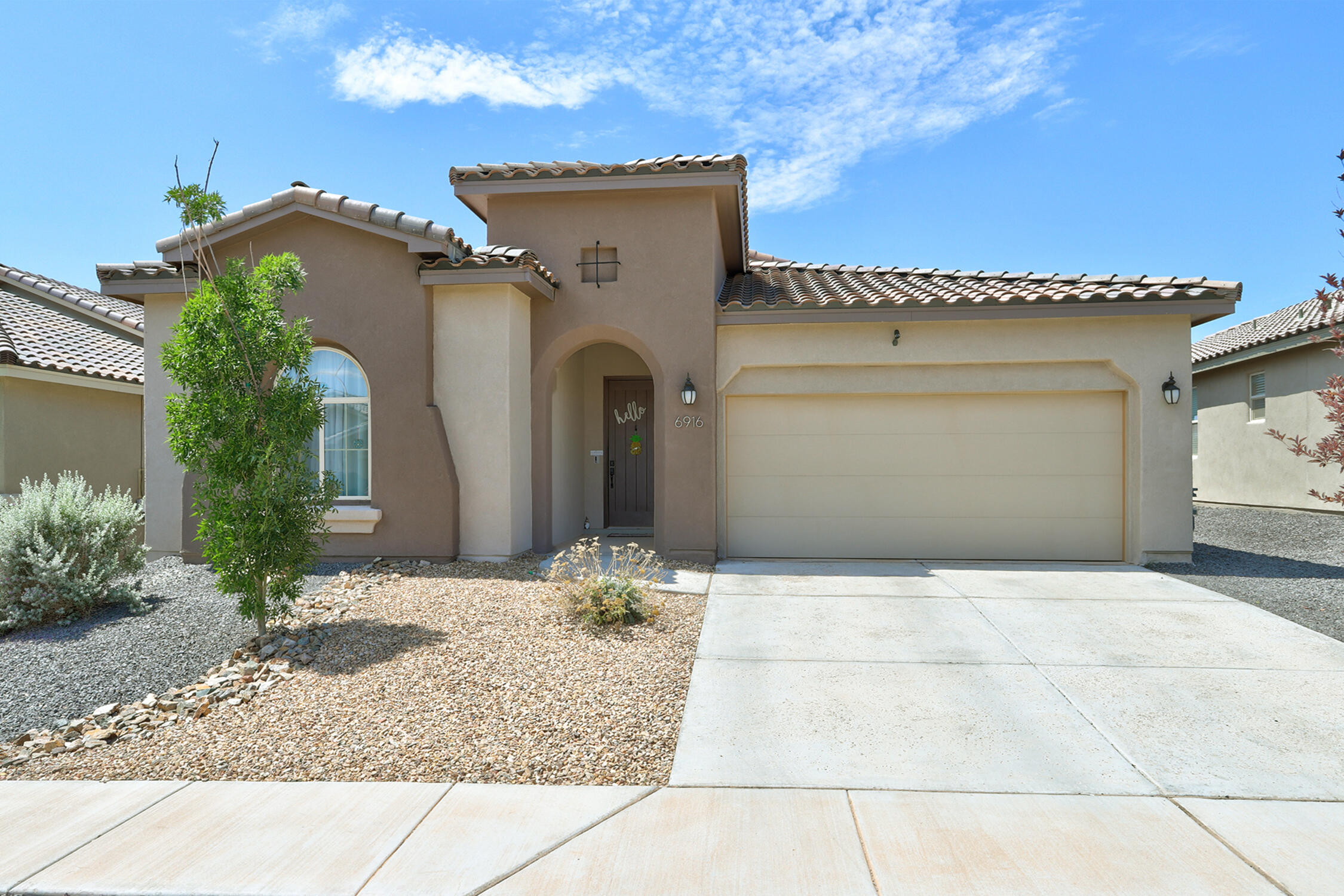 Welcome to 6916 Dusty Dr, this stunning move in ready home, on Premium View lot.  With its open light filled Floorplan, upgraded tile backsplash, SS appliances, large walk-in pantry, 4 bedrooms 3bath  covered patio with views of the Sandia Mts all this in an Awesome neighborhood with highly desired school district and close to hospital, shopping, great restaurants, RailRunner station  and freeway access makes for convenient easy living.  Who could ask for much more?