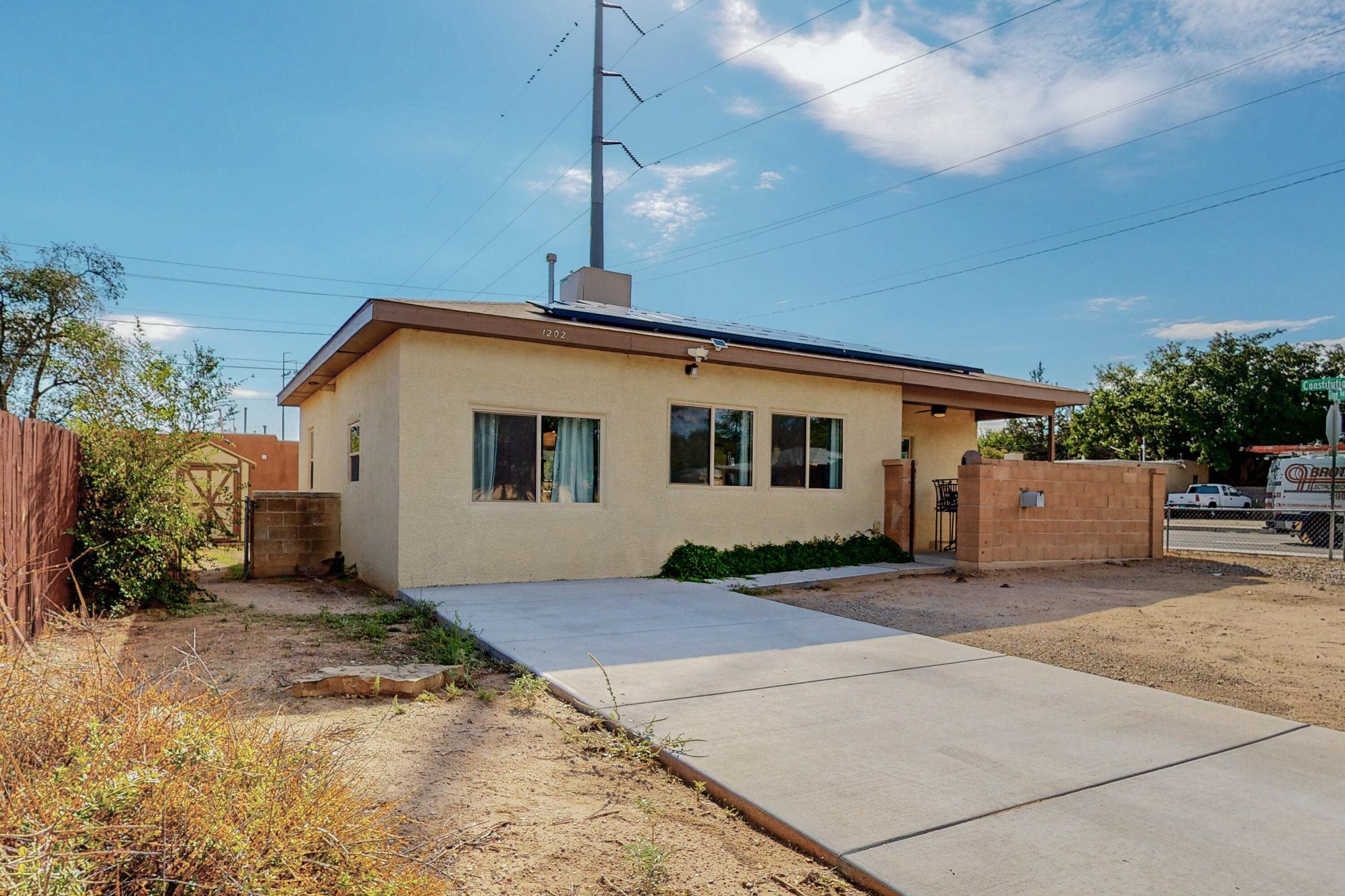 Price reduced!! UNM area, energy efficient Summit Hills home just off of Nob Hill . Come take a look at this charming, 3 bed, 1 & 3/4 bath, fully updated home. So where do I begin? Stucco, Windows and freshly sanded and painted trim in 2022, driveway poured and sewer line installed in 2022. Completely remodeled kitchen featuring tons of gorgeous cabinets for lots of storage, beautiful countertops, gas range and vent hood in 2012 remodel. Newer flooring throughout in 2023, freshly textured and painted throughout and hall bath with new sink and new flooring. Generous Primary Bedroom with 3/4 bath. Large, corner lot and gated entrance in back for extra parking plus cozy front courtyard. This home has been immaculately cared for and is so close to UNM Law School, UNM Hospital and Whole Foods!