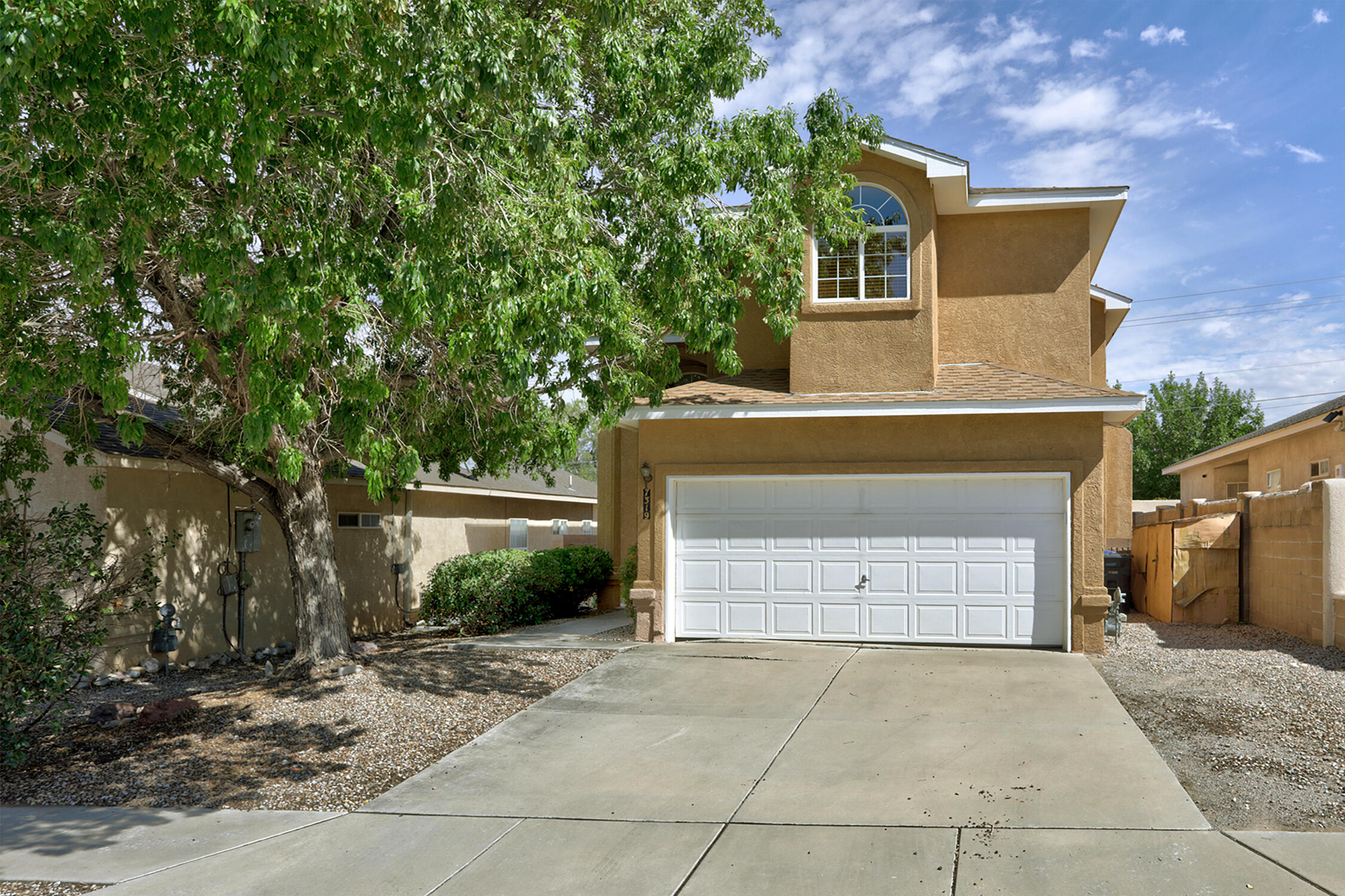 Adorable 3 bedroom home located in the desirable La Cueva school district. This nicely updated 1,690 square-foot residence features an open floor plan, two-way fireplace, granite countertops and stainless steel appliances, creating a perfect space for entertaining. The primary suite has a spacious walk-in closet, an updated primary bath with separate tub and shower, double sinks and granite countertops.  Enjoy the wonderful mountain views from the low-maintenance, xeriscaped backyard and the upper-level balcony.  This home provides ease of access to I-25, Paseo Del Norte, shopping, restaurants and some of the Albuquerque's best outdoor spaces. Schedule your showing today.