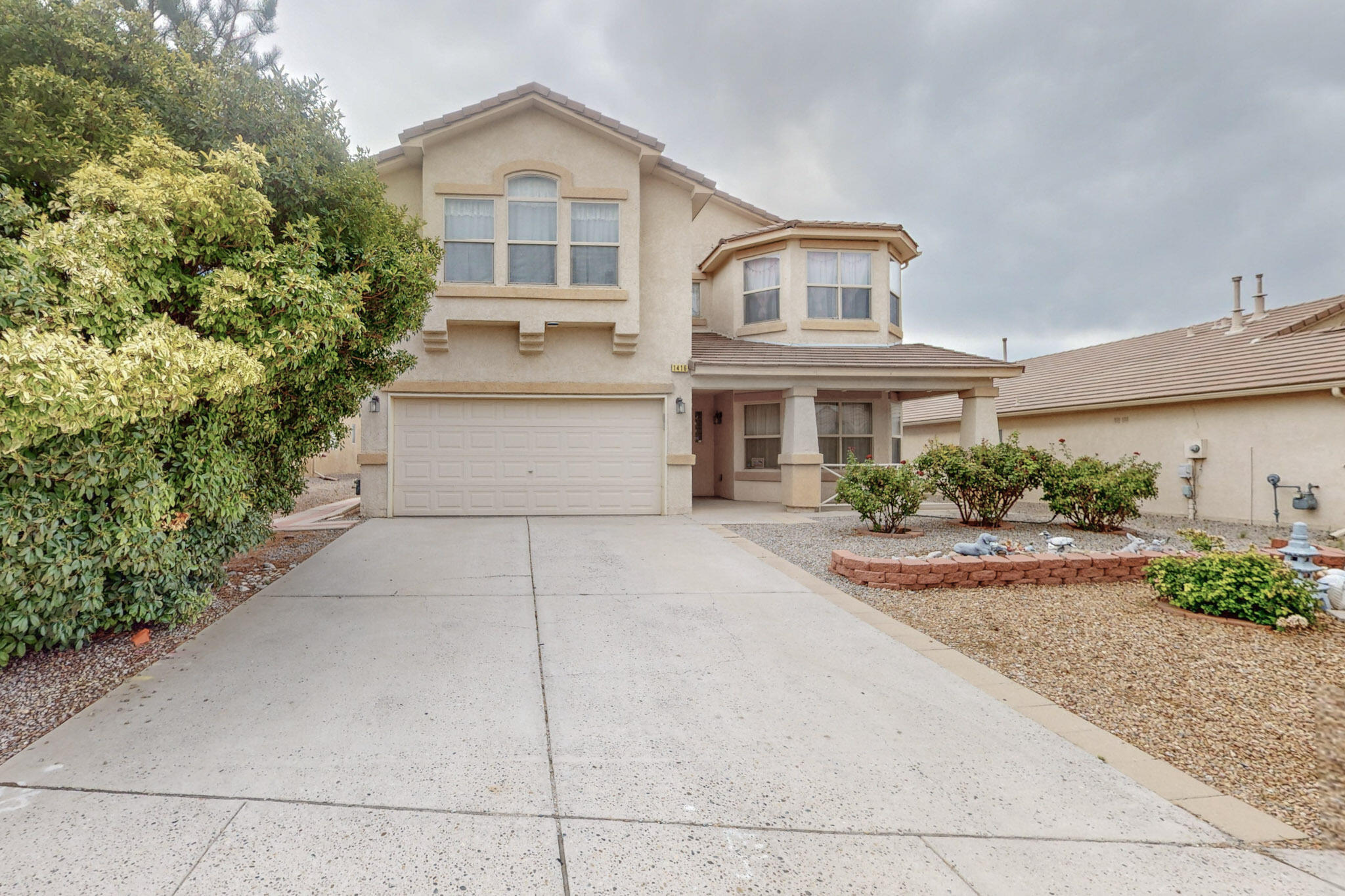 Charm meets convenience in this delightful DR Horton home located in the Cabezon Community of Rio Rancho. Step into a world of warmth and comfort as you enter the open concept living space. This lovely two-story home features living and dining combo, gas fireplace, kitchen space, island, updated countertops, pantry, and an amazing size loft. Embrace the tranquility of the spacious landscaped front and backyard. Your dream home awaits!