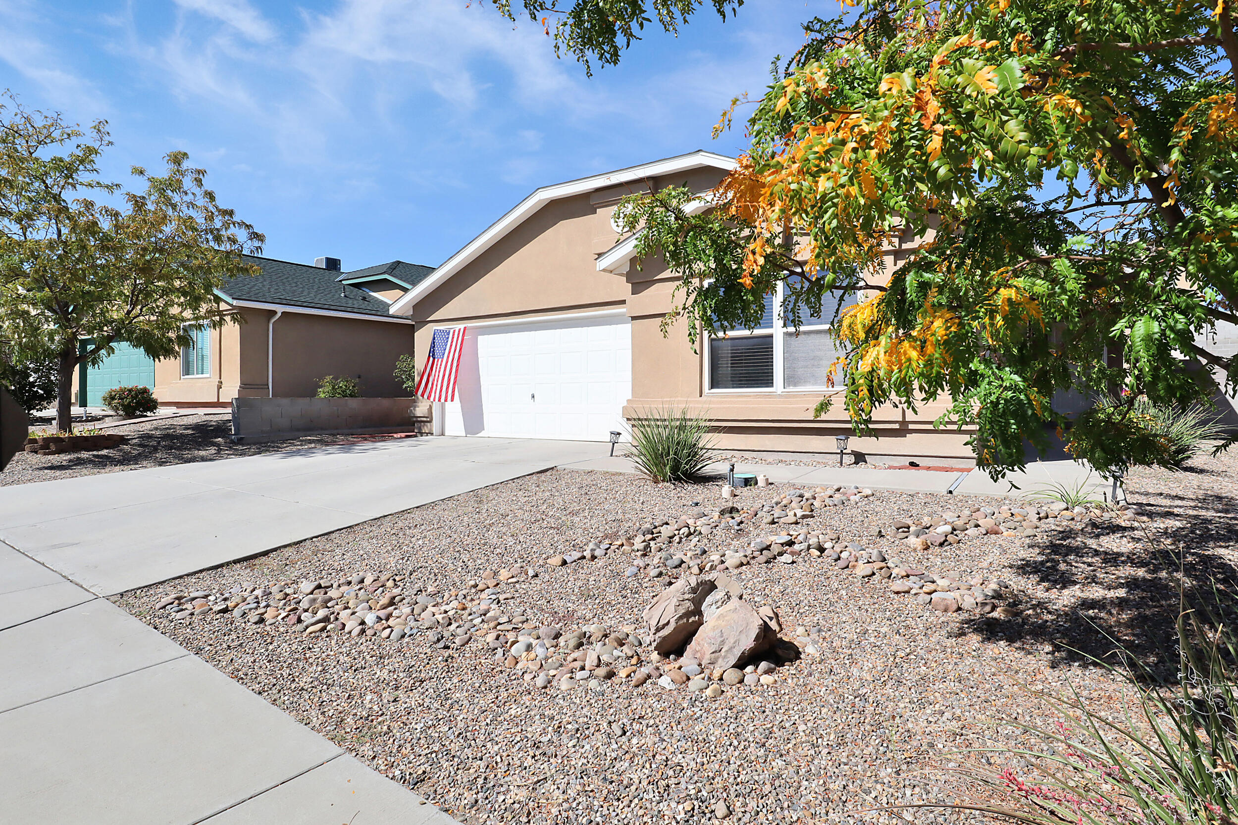 Welcome to this lovely one-story home that has been maintained & enjoyed by the original owners. It is located near schools, restaurants, parks, and even the CNM west side campus. The primary bedroom is nicely separated from the 2 other bedrooms. There are so many things to love about this home including REFRIGERATED AIR, landscaped back yard, high ceilings and no HOA!