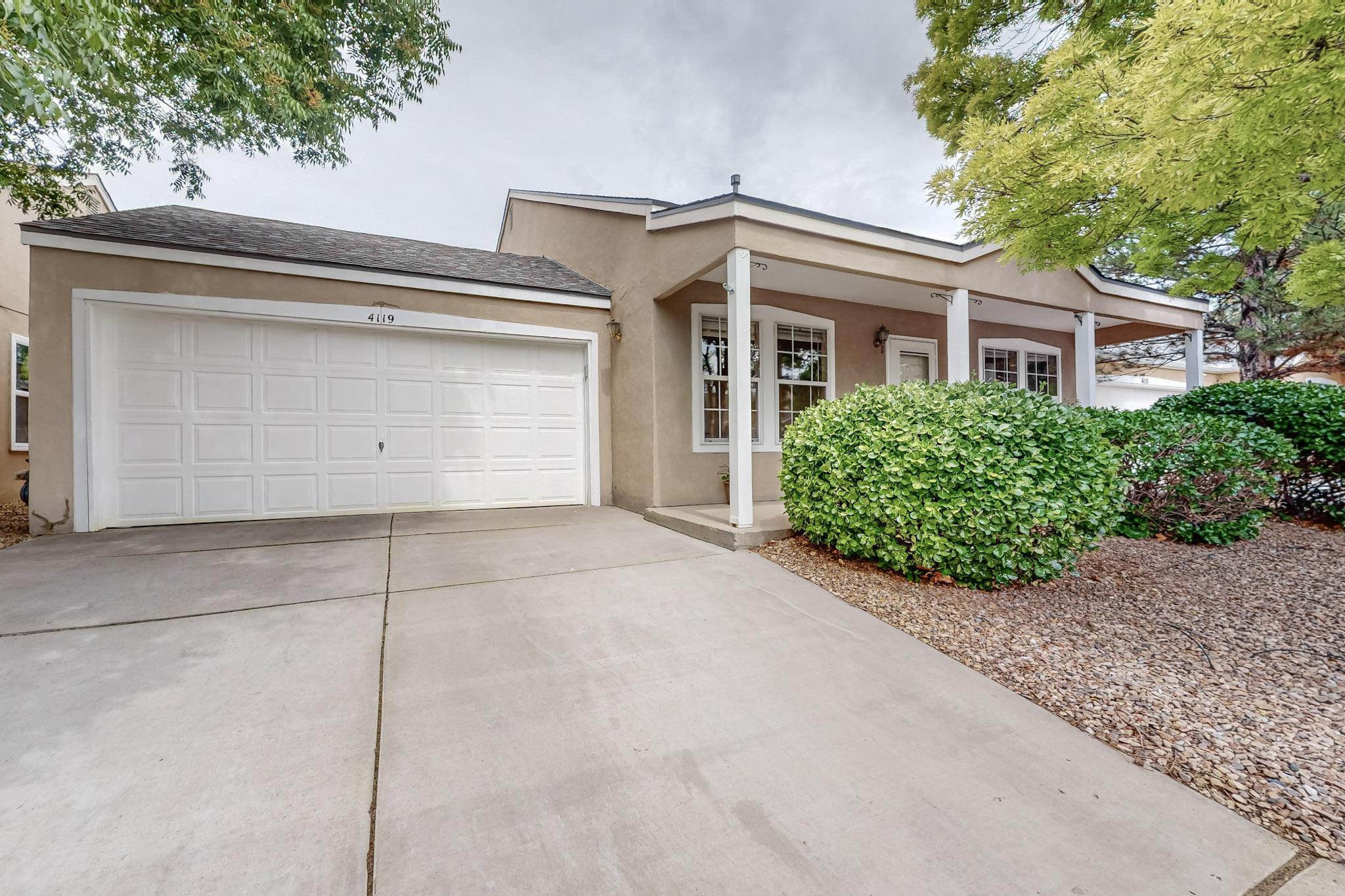 Discover this inviting 3-bedroom, 2-bathroom home with a beautifully flowing floor plan and soaring vaulted ceilings, creating an airy and open feel. The spacious master suite, located on the main floor, features a walk-in closet for all your storage needs. A unique feature is the 2-car garage with a convenient drive-thru stall that provides direct access to the backyard, perfect for additional parking or storage. Situated in a highly sought-after area, you're just minutes away from shopping, parks, schools, and popular restaurants, offering both comfort and convenience.