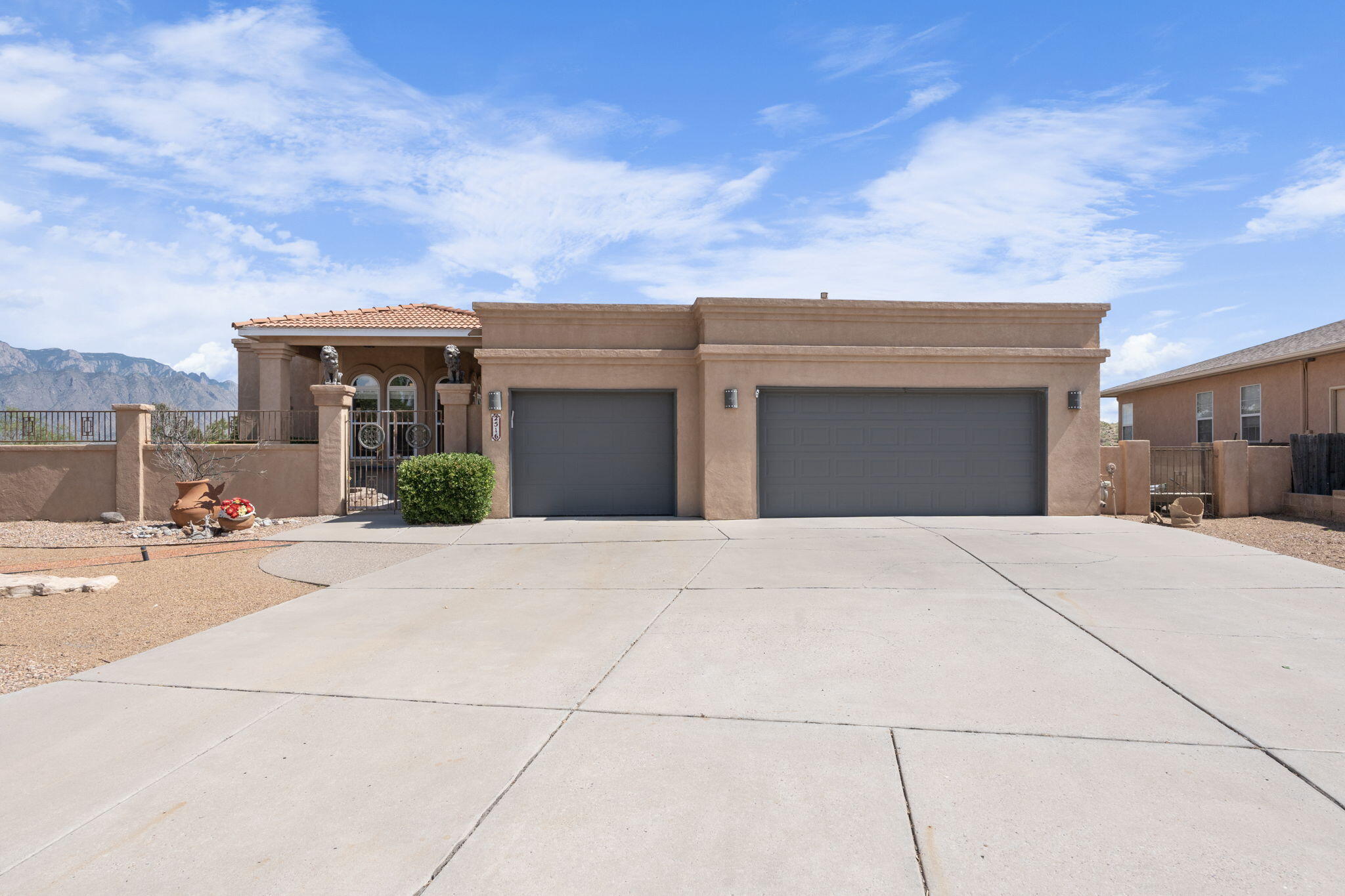 Gorgeous 3 Bedroom/3 Bath gem with stunning views of the Sandias, Rio Grande and Albuquerque! A dream home with 2608 S.F. of elegant living space perfectly designed for comfort, style & views! Whether you are relaxing on one of the several patios or unwinding in the hot tub, you'll find tranquility & inspiration in these scenic surroundings.  Relax in the inviting great room, featuring a gas fireplace & high ceilings that enhance the airy, open floor plan. You'll love cooking in this chef's kitchen, complete with an island, pantry, white cabinets & solid surface countertops.  Formal living & dining areas with wet bar for special gatherings. Luxurious primary suite boasting separate jetted tub & shower and walk-in dream closet. Fully landscaped, built-in barbecue, 3-car garage, & solar.