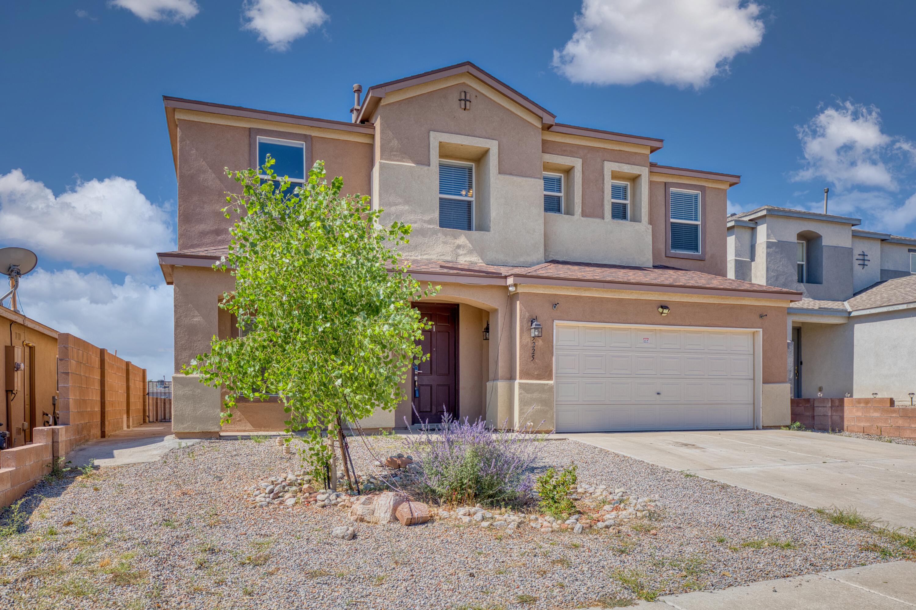 Thriving location! This stunning home offers 2900+ of energy efficient living space due to the PAID OFF SOLAR, & new refrigerated air. The kitchen is a chef's dream, boasting newer appliances. Multiple living areas are perfect for entertaining. The primary suite has a luxurious bathroom complete with a soaking tub, walk-in shower, large walk-in-closet.   Located in a top-ranked school district. Step outside to the immense yard with breathtaking views of the Sandias.