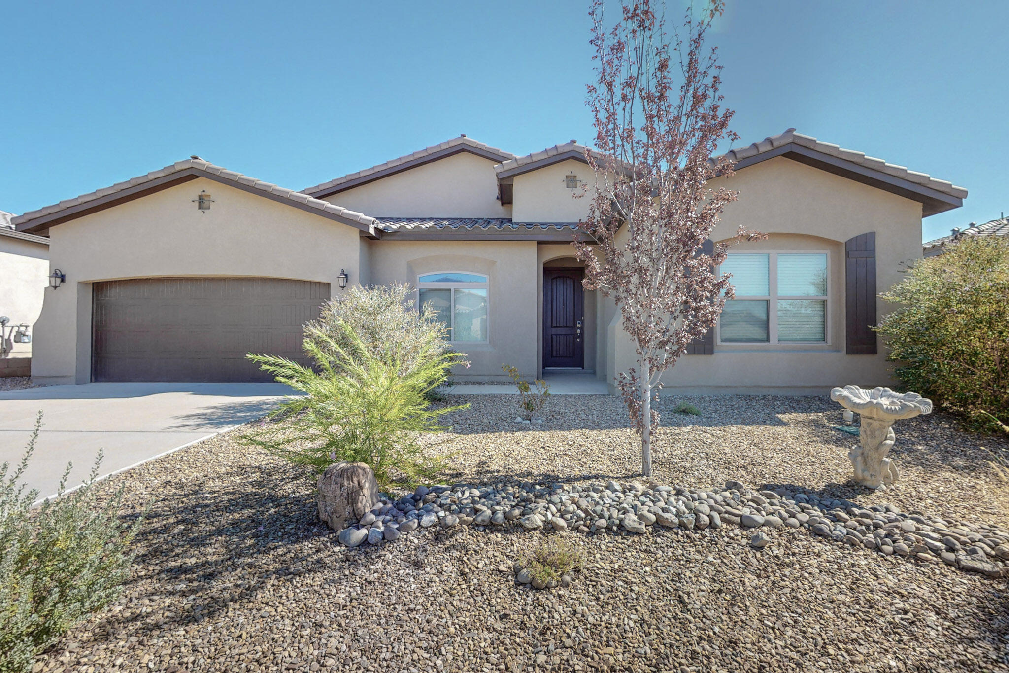 Welcome to this beautiful Abrazo home in Lomas Encantadas. This home was recently built in 2021 and it offers a perfect blend of comfort & convenience. The bright open floor plan is very practical and it includes 4 spacious bedrooms, 3 bathrooms, large closets, walk-in pantry and more. This beauty is clean, well cared for and it is fully landscaped. The garage offers additional space and built-in overhead shelves for extra storage. The backyard is large and it boasts a generously sized covered patio. Come and see for yourself, this is a nice opportunity to get into a newer, well priced home in a good location.