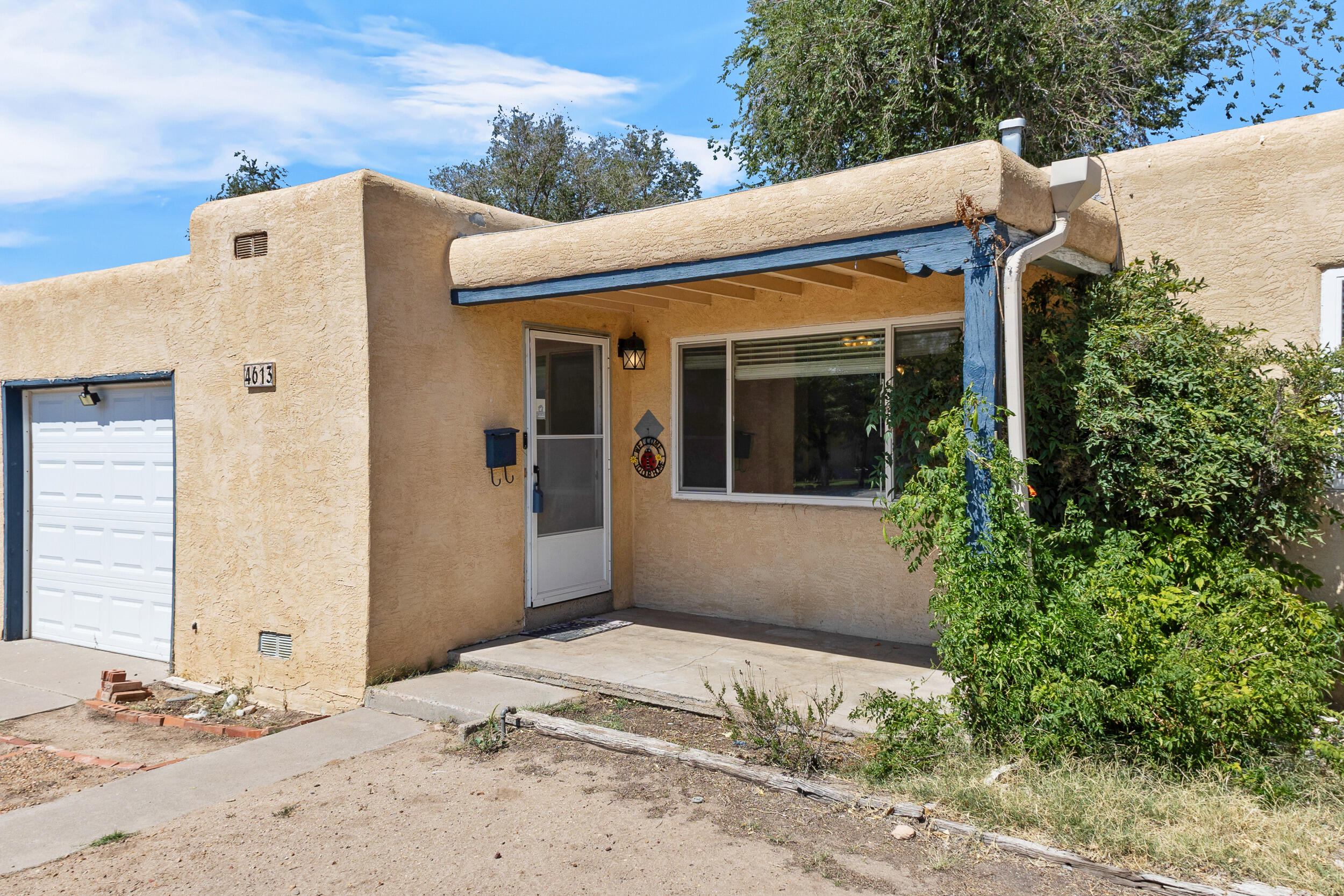 Huge Price Improvement! Nestled in the desirable Ridgecrest Addition, this lovely home is priced to sell! Featuring 2 bedrooms and 1 bathroom, this vintage property exudes charm with hardwood floors throughout and a bright, open floor plan. Enjoy the spacious backyard and ample front driveway. Conveniently situated near UNM, this home is surrounded by a wonderful neighborhood with fantastic neighbors.