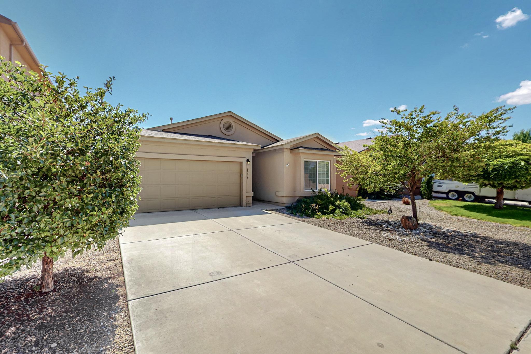 Discover your perfect haven in this charming Rio Rancho residence! This delightful home boasts four cozy bedrooms  offering plenty of space for family and friends. The generous living room invites relaxation, while the spacious kitchen with dining area and pantry will inspire your inner chef. Retreat to the primary bedroom, featuring a walk-in closet and custom-tiled walk-in shower that'll make you feel like royalty. Light and bright throughout, this home radiates warmth and comfort. Step outside to find a spacious backyard, perfect for weekend barbecues or stargazing nights. With nearby amenities, this property offers the ideal blend of comfort and convenience. Don't miss your chance to make this house your home sweet home!