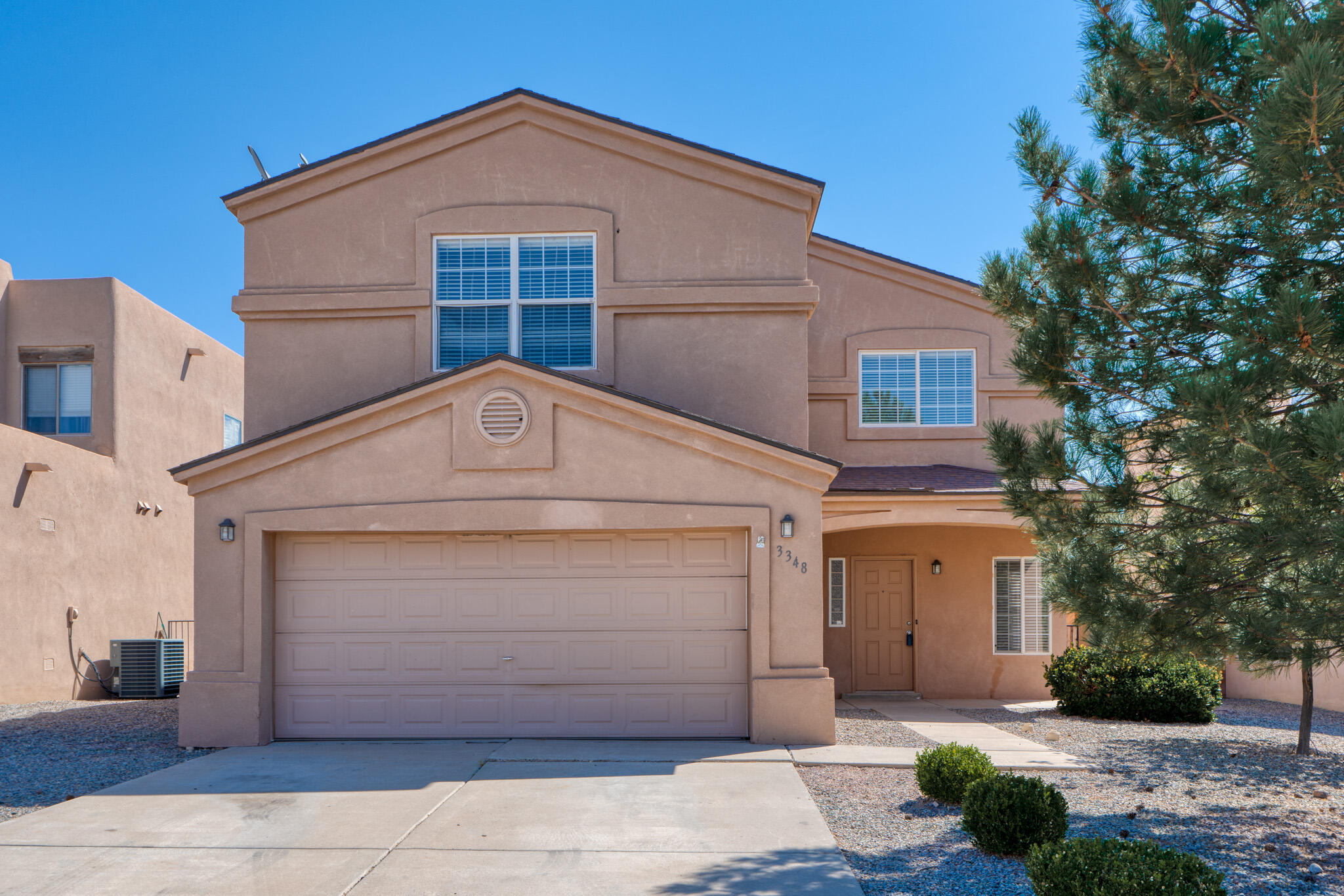 Welcome to this spacious 3000 sq ft home in Northern Meadows. The large kitchen has maple cabinets, an island and solid surface countertops plus a huge pantry off the laundry room.  The kitchen opens to a great room with a gas log fireplace.  The primary bedroom has a garden tub, separate shower, double sinks and views of the Sandia's from the bedroom balcony.  There are 4 additional bedrooms and one has it's own private full bathroom.  The HOA maintains the front yard.