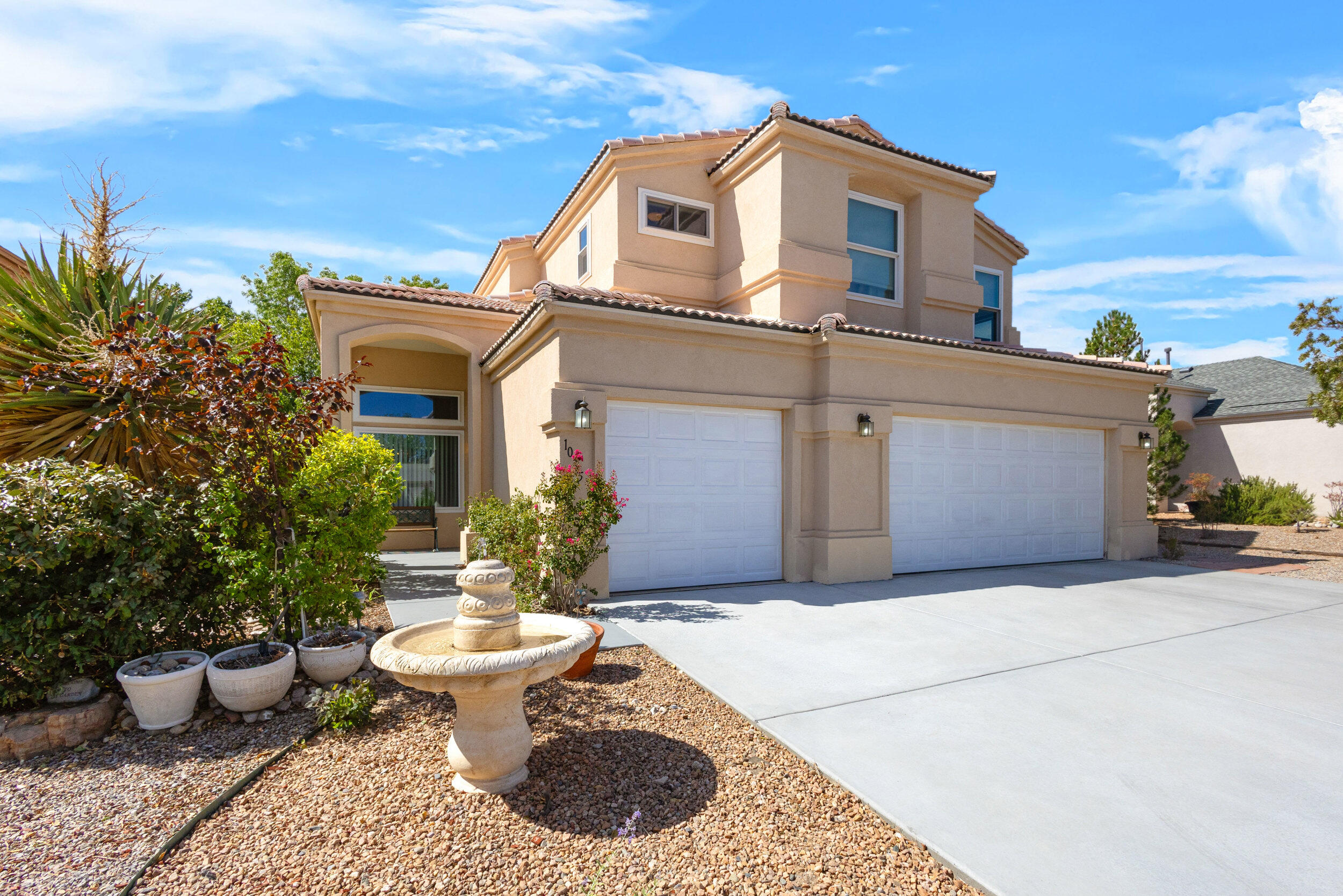 This beautiful Ventana Ranch home offers ample space and a three car garage! Walking distance from parks and many amenities nearby. Updated kitchen with granite countertops, backsplash and painted cabinets. 2 living areas downstairs, a formal dining area, and a loft upstairs. The large owner's suite has a deck, two way fireplace into the bathroom with separate his/her sinks, a garden tub and shower. Also a huge walk-in closet! The lush backyard provides a private oasis with lots of greenery, trees, plants and a covered patio. There is also backyard access! Flooring includes wood, tile and newer laminate upstairs. NO carpet! Refrigerated air. Don't miss out on your chance to own this beautiful home in a great neighborhood.