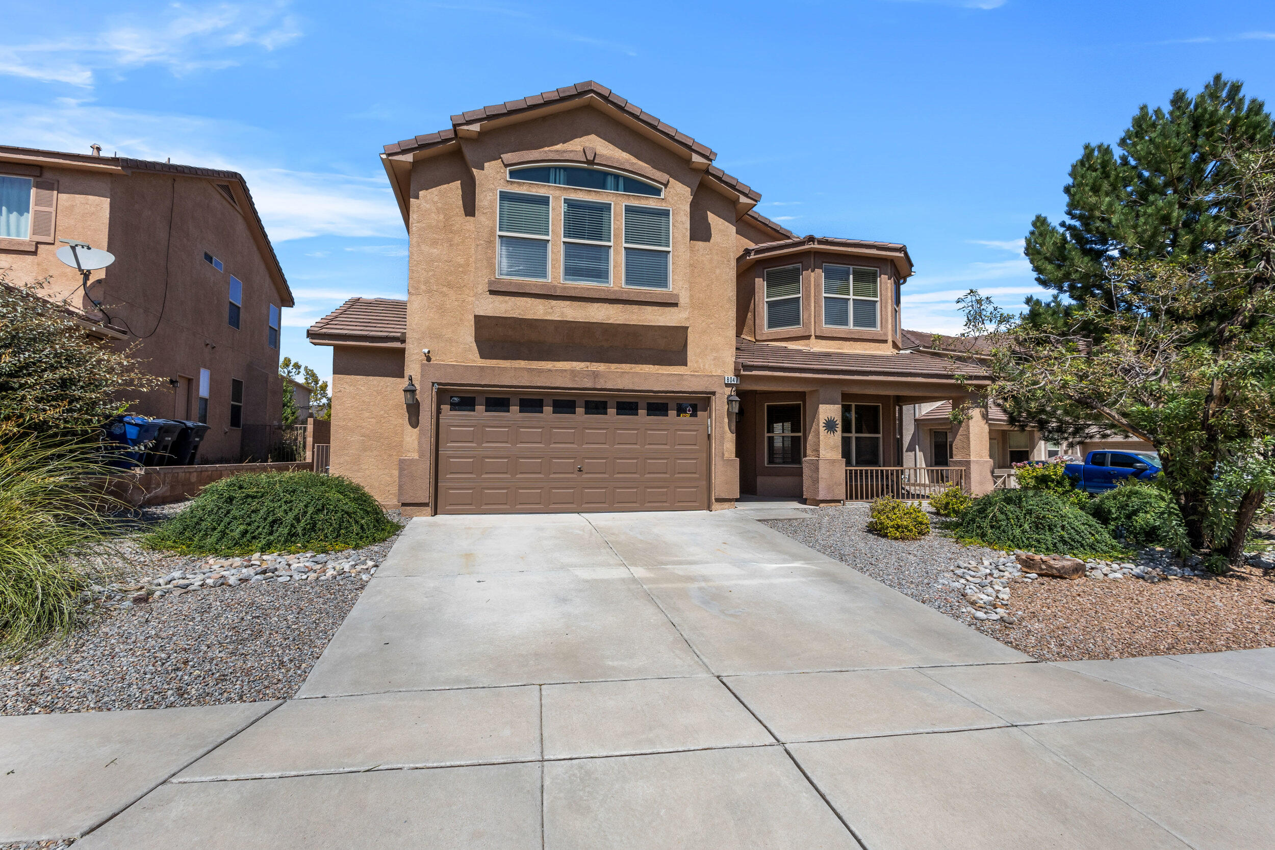 Discover this stunning 3-bedroom, 2.5-bathroom, 2,840 sq. ft. home nestled in the sought-after Ventana Ranch West neighborhood. Built in 2006, this move-in ready gem features a welcoming front porch, formal living and dining rooms, and a spacious family room with a cozy fireplace. The chef's kitchen boasts stainless steel appliances, Corian countertops, and a wet bar, perfect for entertaining. Enjoy modern comforts with a split floor plan, large bedrooms, and energy-efficient updates throughout. Plus, two double garages provide ample storage. Ready for you to call home!