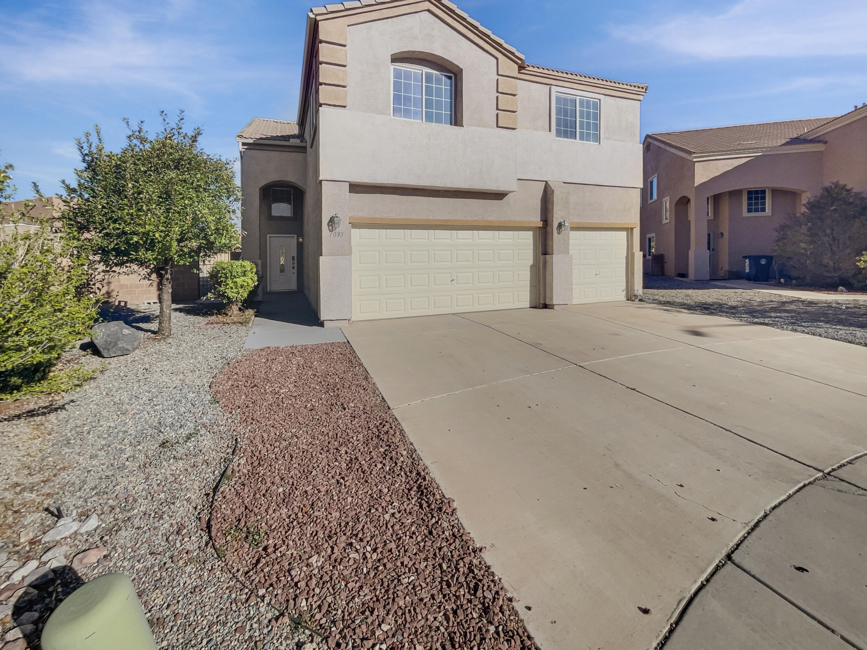 Welcome to this beautiful property featuring a neutral color scheme and fresh interior paint that creates a calming atmosphere. The kitchen is a chef's dream, complete with a convenient island and stainless steel appliances. The primary bedroom includes a spacious walk-in closet, while the primary bathroom offers double sinks and a jacuzzi tub. Enjoy the outdoors on the covered patio in the fenced backyard with a low-maintenance landscape. Recent flooring updates add a modern touch. This property is a must-see for anyone looking for a comfortable and stylish home.