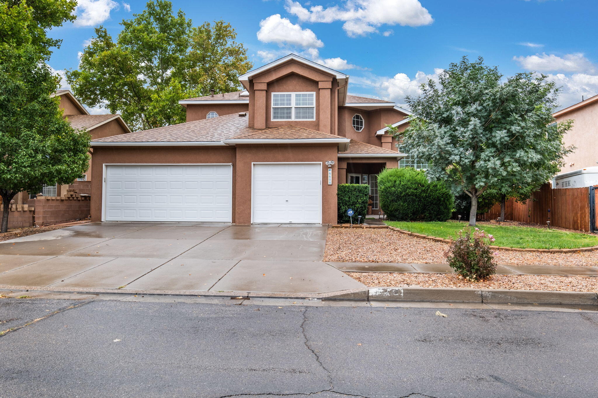 Welcome to this bright and airy 4-bedroom, 3-bathroom home in Albuquerque! With 2,329 square feet, two spacious living areas, and soaring ceilings that fill the home with natural light. The kitchen features sleek quartz countertops, perfect for casual meals and gatherings. Step outside to a large backyard with incredible mountain views--ideal for weekend barbecues or morning coffee. The primary suite includes a private, covered balcony with unbeatable views of the Sandia Mountains. Enjoy refrigerated air, great schools, and easy access across town in this inviting home!