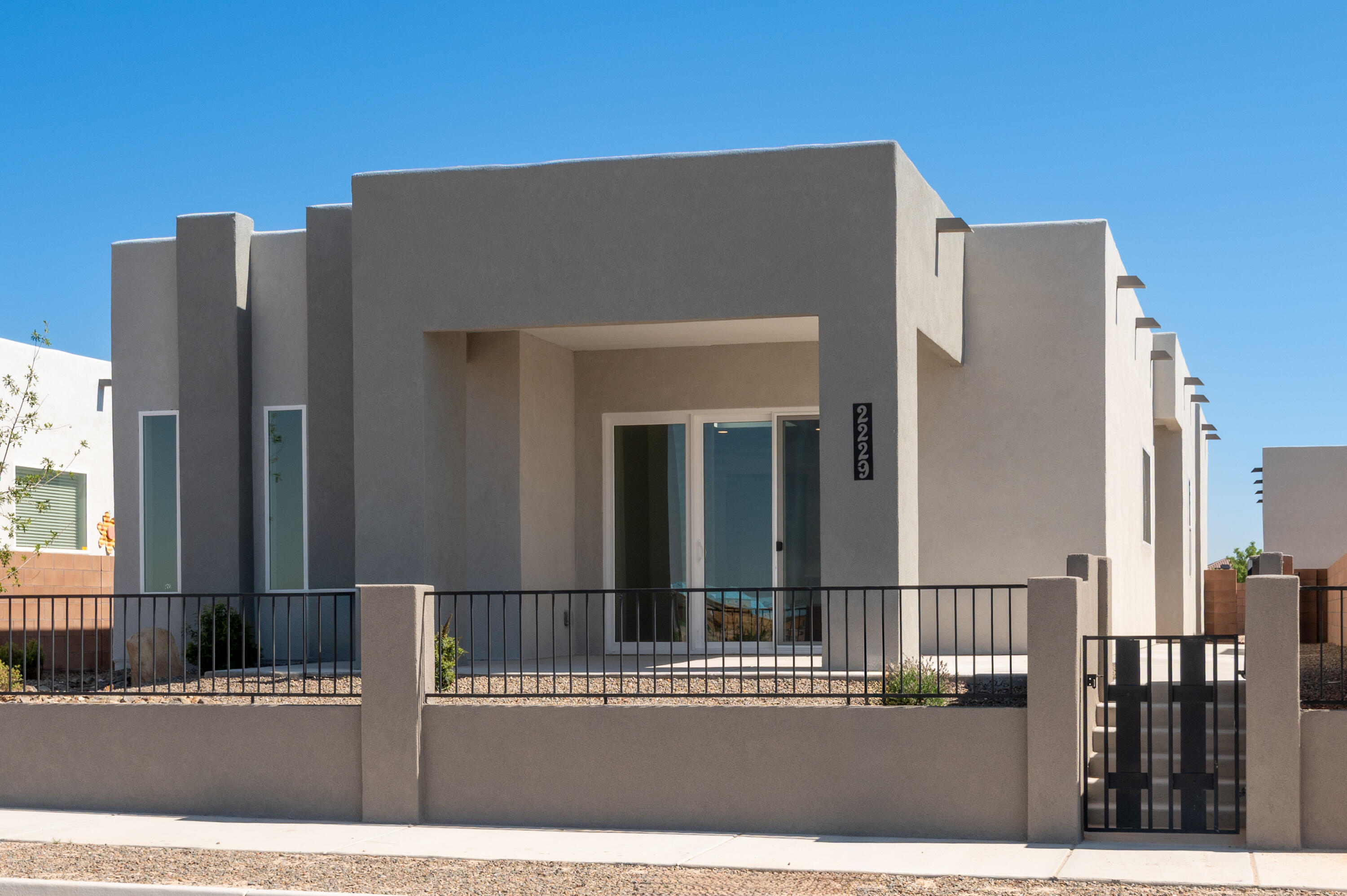 Welcome to the Albuqurban 1878, where 1,878 square feet of pure ''front porch living'' magic awaits you! This single-story stunner, exclusive to Mesa del Sol, has three bedrooms, two baths, and a two-car garage--so yes, there's room for all the essentials and maybe even that treadmill you keep meaning to use. If you are someone who appreciates a life of comfort and style, this home is designed to meet your needs (and then some). With its open-concept layout, the Albuqurban 1878 is basically a social butterfly in house form. The kitchen flows right into the dining and living areas, so you can whip up a meal while still catching the latest drama at the table. Appointed with Bosch appliances, your cooking space becomes the kind of place where even toast feels fancy. The generous living a