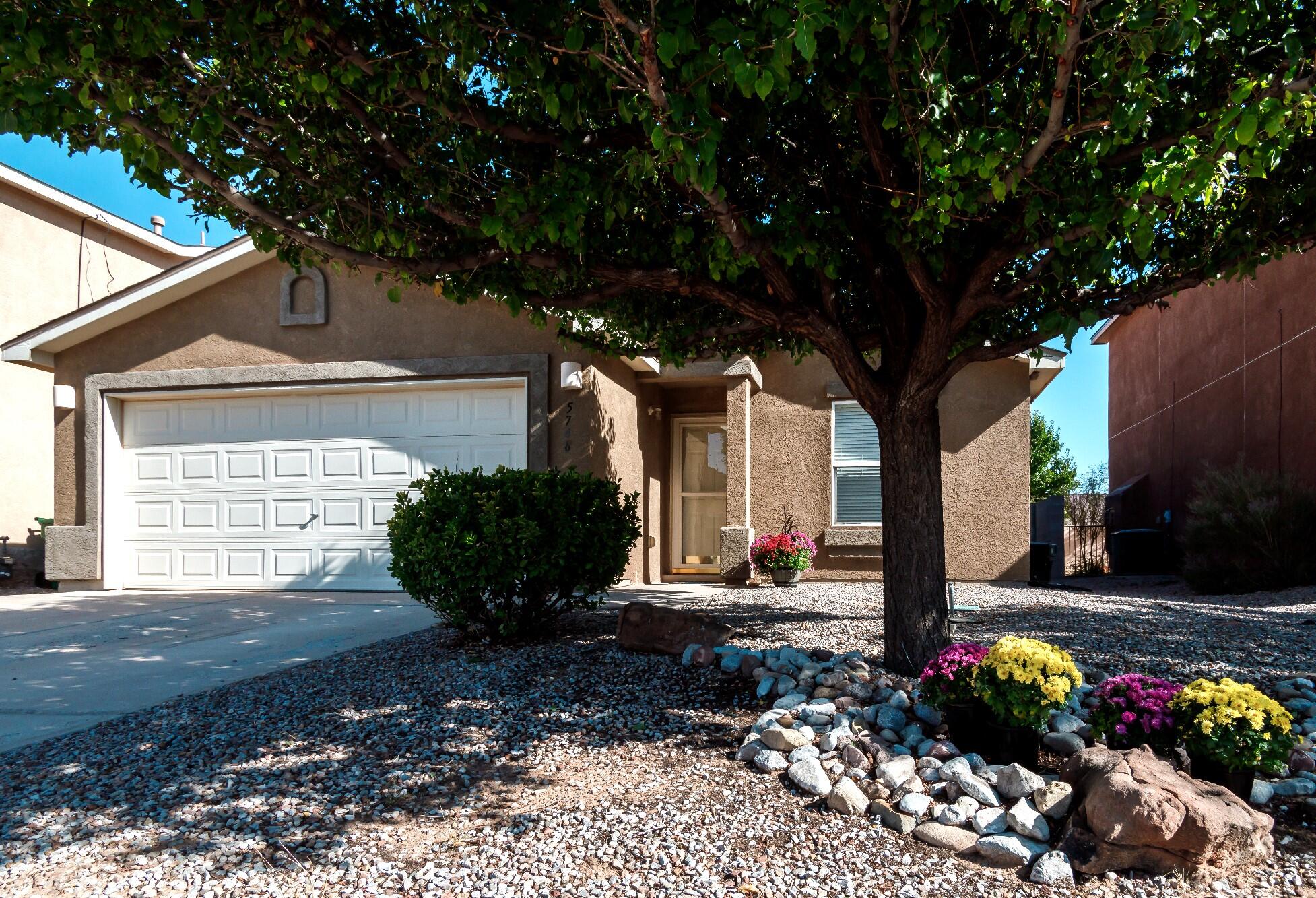 Welcome to this lovely one-owner home in Enchanted Hills.  New roof and water heater in 2023.  Kitchen appliances, washer/dryer, and water softener included.  Bright kitchen features island with storage, pantry, and under cabinet lights.  Refrigerated air.  Electronic programmable Wi-Fi thermostat.  Primary bedroom with walk-in closet, bath with double sinks, spacious garden tub, and separate shower.  Fully landscaped with automatic watering timer.  Enjoy the privacy of a backyard with high walls and hedges.  Spacious patio includes outdoor furniture and fire pit.   Conveniently located with easy access to  Hwy 550, Hwy 528,  I-25, shopping, and restaurants.  Only 24 miles to Albuquerque and 50 miles to Santa Fe.  Schedule a tour today!