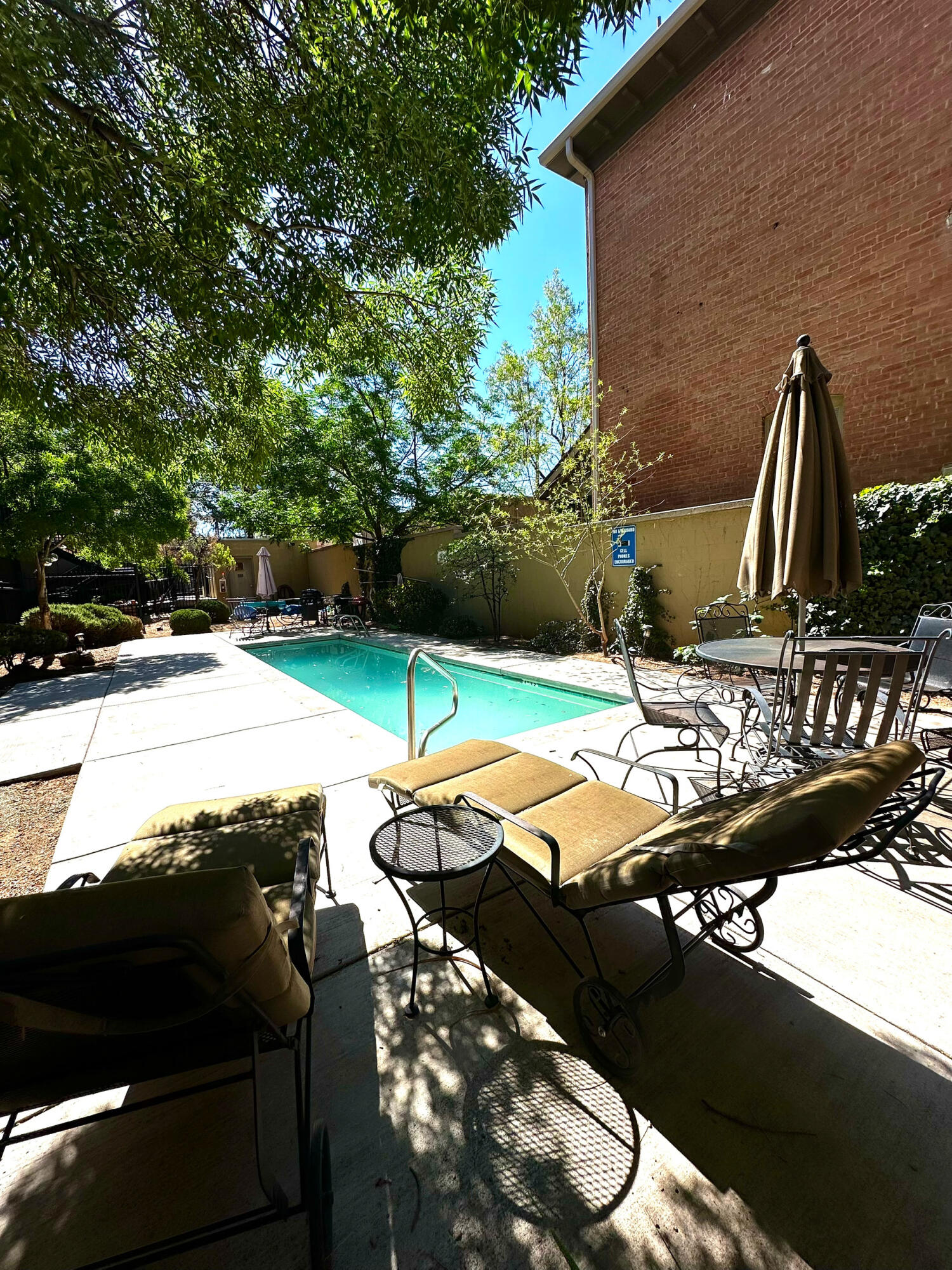Stunning One-Bedroom Condo with Price Drop! Dive into Summer Fun! The common area pool is just about to open, offering the perfect escape to soak up the sun and enjoy those hot summer days! Whether you're looking to relax or entertain, this poolside oasis is the ideal spot! This beautifully updated one-bedroom, one-bath condo with fresh, new floors (2/26/25), large glass doors, and a charming Juliet balcony, this space is designed to bring in the light and elevate your lifestyle! Situated in a vibrant neighborhood with quick access to shops, dining, and recreation, everything you need is right at your fingertips!  Schedule your private viewing and experience everything this beautiful condo has to offer!  Buyer to confirm actual sq ft.