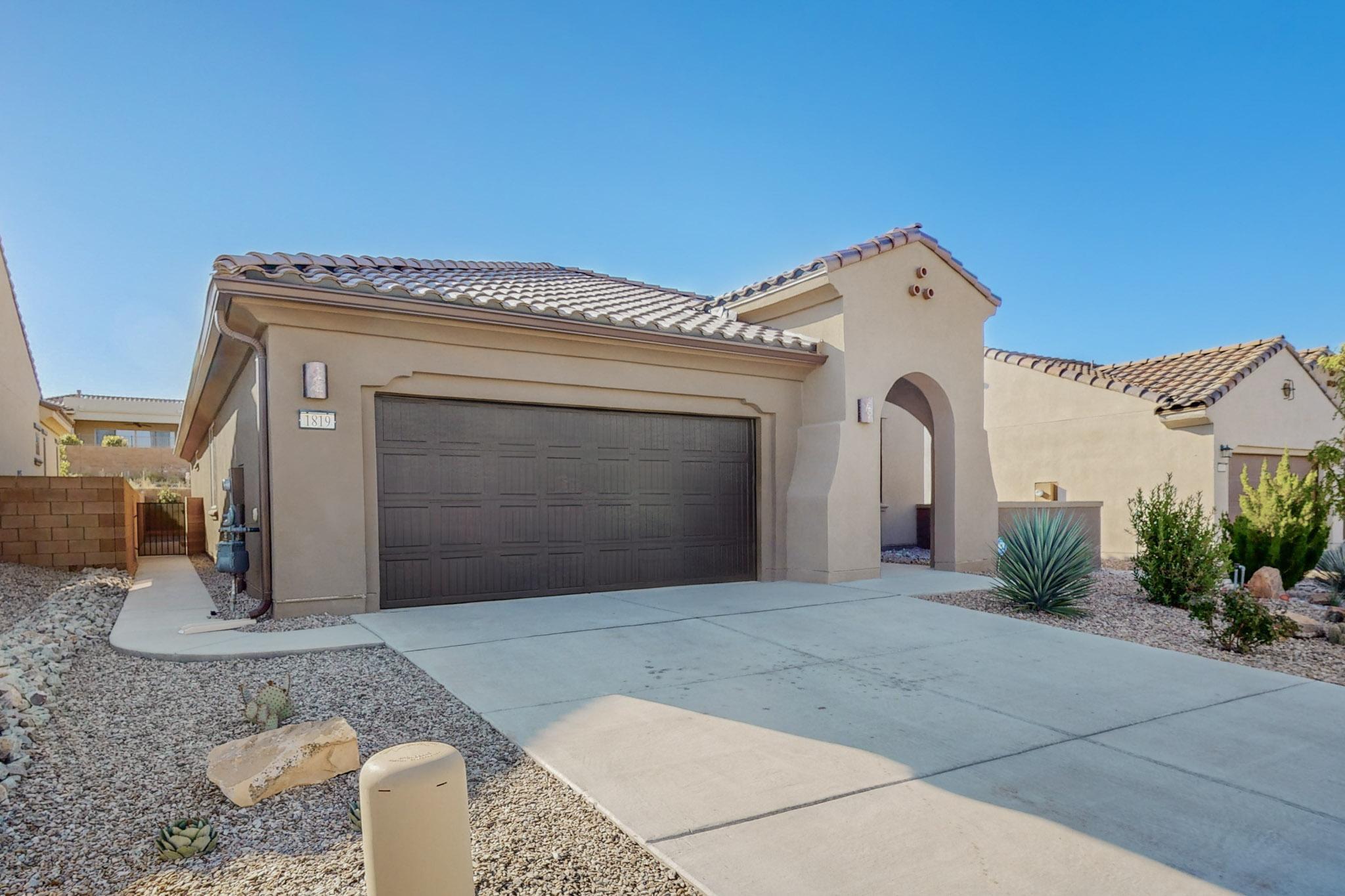 Immediate Move In Ready Home in Del Webb Mirehaven, a 55+ Active Adult Gated Community!  Built in 2020, this home offers 1869 SF, 2 BR's plus a Den/Office or 3rd BR, 2 BA's, 2 CG & backs to open space!  Home features a beautiful kitchen w/ tile backsplash & granite, beautiful cabinetry raised dishwasher at the island, pantry, SS range hood, SS Appliances & opens to living & dining rooms. Primary bath has a shower w/ bench, huge Walk-in-Closet w/ extra shelving, Dbl Sinks, beautiful tile flooring & carpet in the BR's & Den, Plantation Shutters throughout! Recirculating pump for the tankless water heater! Large covered patio w/ custom landscaped yard & a view of the Petroglyphs. You'll love the Sandia Amenity Center w/Tennis & Pickle Ball Courts, Outdoor Pool, Gym, Daily Activities!