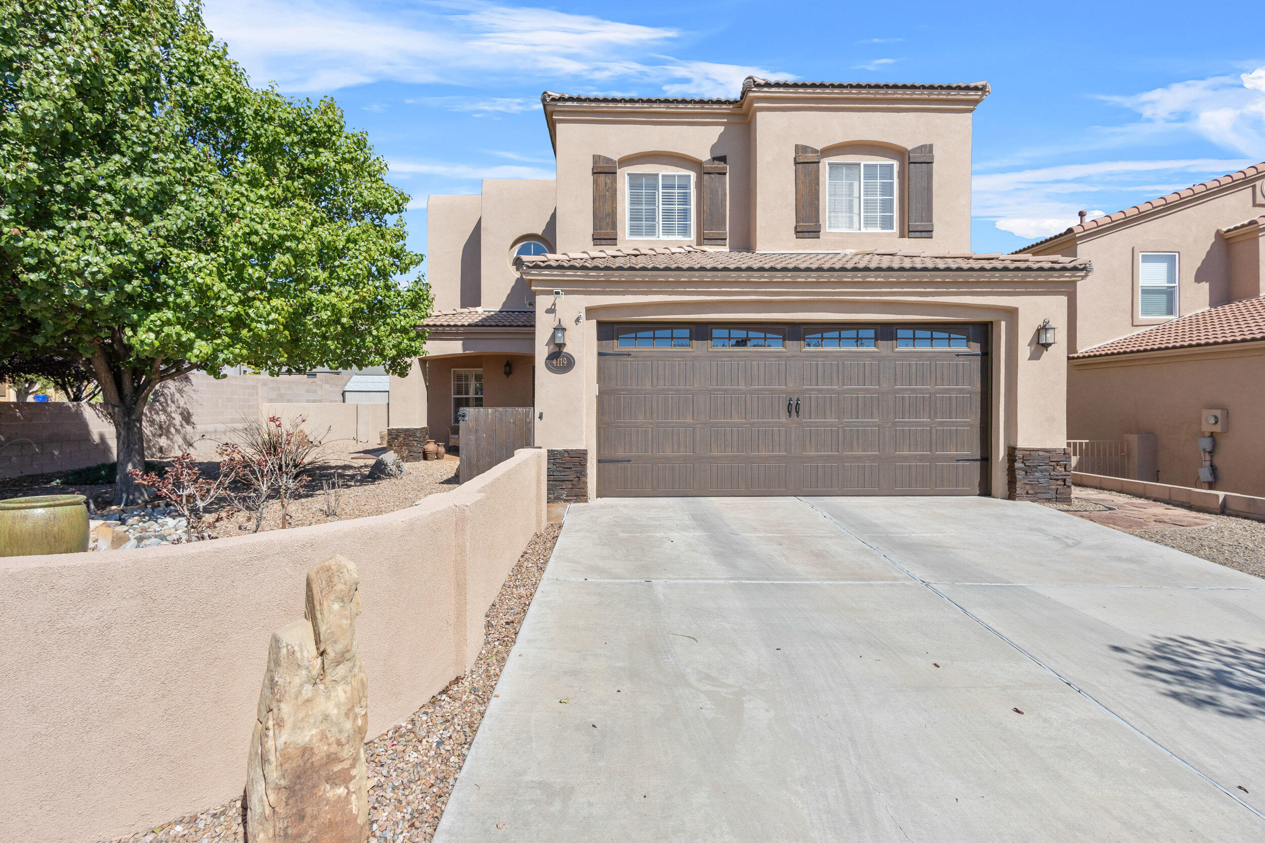 This beautiful two-story home features 3 spacious bedrooms, 2.5 baths, and 2-car garage, all situated on a desirable corner lot.  Walkable to Flix Brewhouse, Albertsons, and Sprouts, as well as a variety of dining options. Enjoy scenic walks along the nearby Rio Grande River and the serene Bosque trails. With a perfect blend of comfort, style, and prime location, this home is ideal for those seeking both convenience and a vibrant lifestyle.  The loft is a great location for a home office, second living area, gym or craft area.  The kitchen is sure to please the cook with an abundance of counter space, newer appliances and white cabinets.  You will love spending time in the private backyard with covered patio, gazebo and grass-like turf.