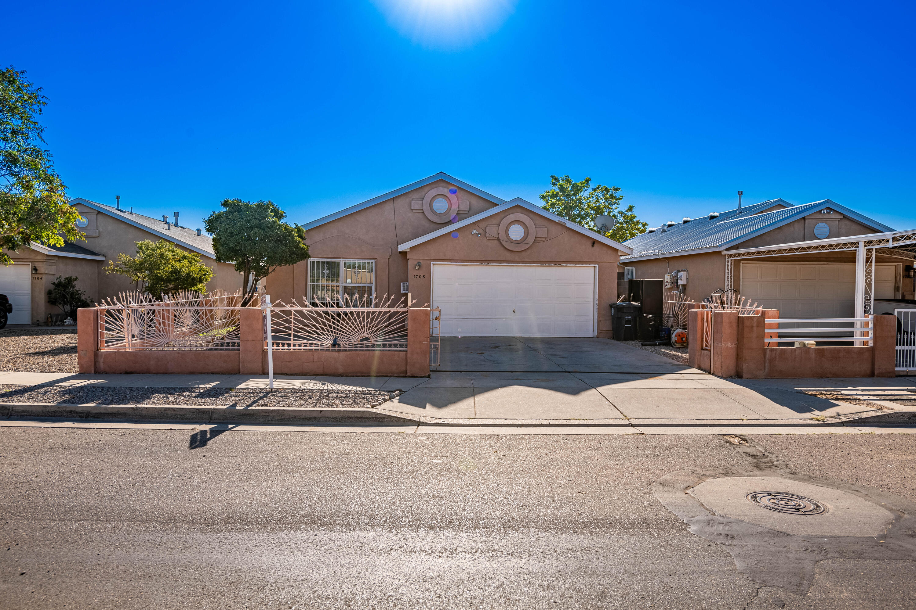 Charming 4-Bedroom, 2-Bathroom Home in Southwest AlbuquerqueWelcome to this single-story home, offering 4  bedrooms and 2 full bathrooms. Nestled in the heart of Southwest Albuquerque, this home features a secure front yard with an iron gate, providing both privacy and curb appeal.Stay cool year-round with refrigerated air conditioning, a must-have for New Mexico summers. The open floor plan flows seamlessly from the living area to the modern kitchen, making it ideal for entertaining. Enjoy the outdoors in the fenced backyard, offering plenty of space for relaxation, play, or gardening. Whether you're hosting a summer BBQ or simply enjoying the quiet, this backyard is perfect for it all.Located close to schools, parks, and shopping, this home has everything for you,