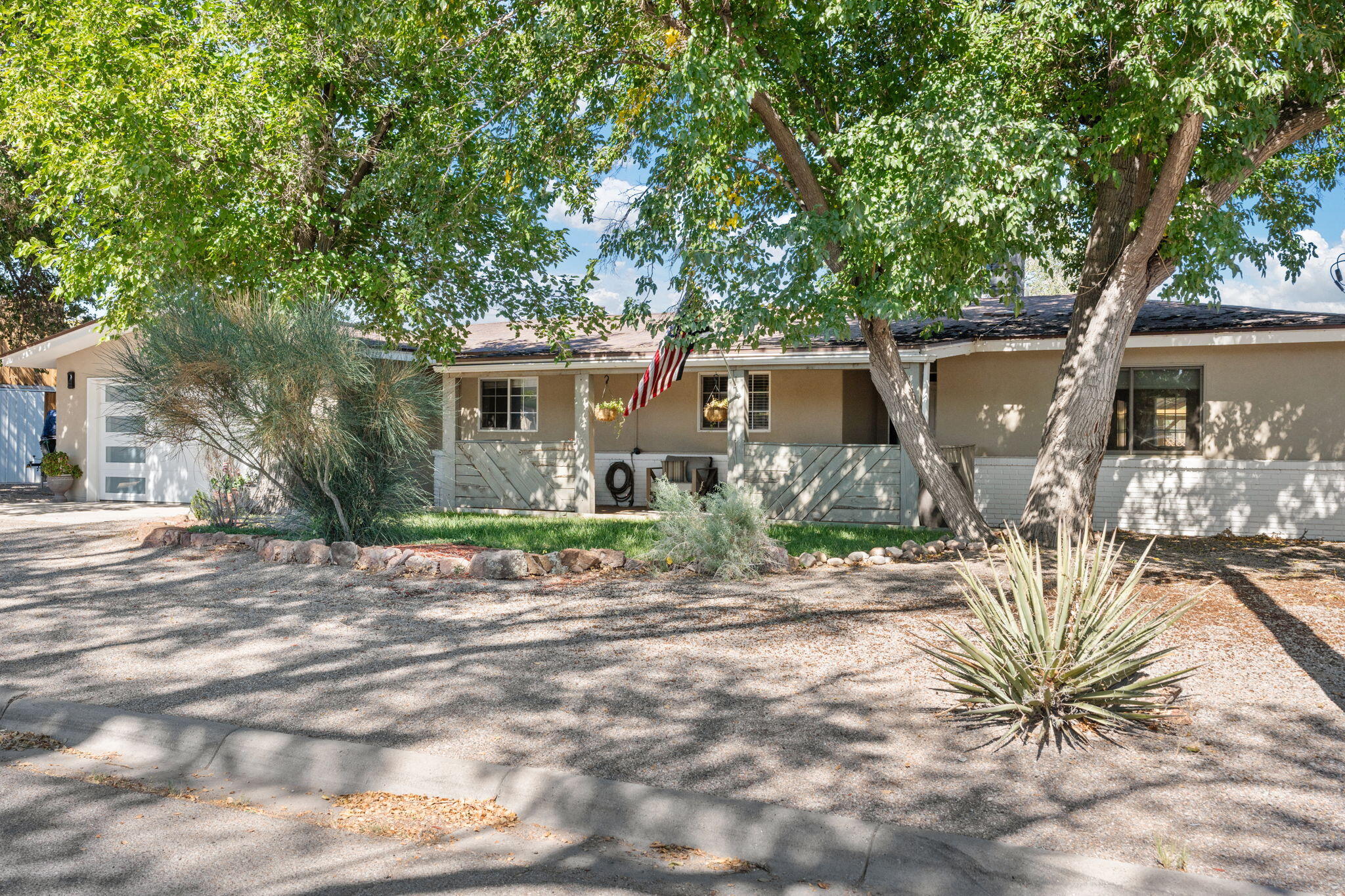 This adorable Corrales home sits on .4 acres and is located in the heart of the green belt off of a paved road. This property has been wonderfully cared for and is ready for new owners. Some of the perks of this home include; newer flooring, stucco, windows and new stainless steel appliances. 2 car garage and refrigerated air. Three bedrooms with a bonus room that could be used as an office or an extra bedroom. The backyard is peaceful and ready for relaxation or hosting. Side yard access, huge chicken coop, new gazebo, grass and large storage shed/workshop add to the charm. Centrally located to all the wonderful things the village has to offer. Close to walking trails and the bosque. Come see this wonderful property today!