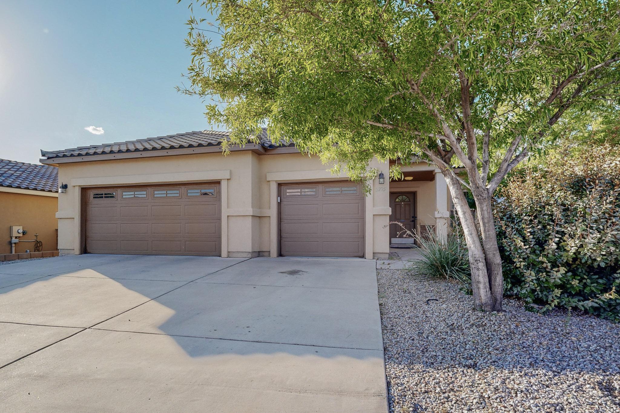 This charming single-story home boasts three spacious bedrooms and two bathrooms, along with a generous three-car garage ready to accommodate all your adventures. The heart of the home features an open floor plan, seamlessly connecting multiple living spaces. In the kitchen, culinary dreams come to life with a upgraded kitchen sink, large pantry,  and stainless steel appliances. Retreat to the primary bedroom, with a walk-in closet and private bath offering double sinks, creating a serene escape after a long day. This home features a tile roof, refrigerated air, a tankless water heater for endless hot showers, and wood blinds for privacy.  Conveniently located in the heart of Rio Rancho!