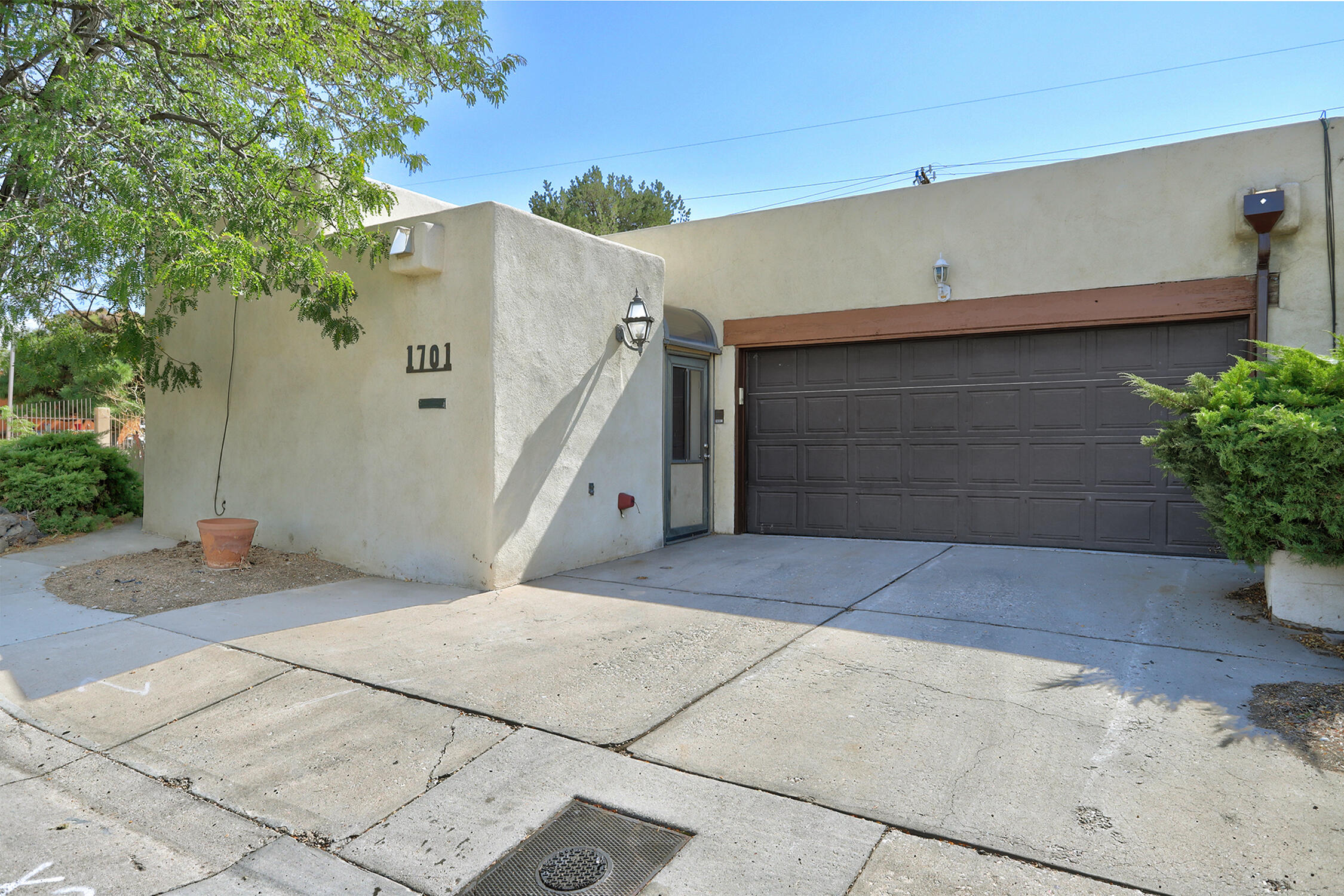 Wonderful home convenient to shopping, transportation and UNM. Cozy up to the fireplace in the winter. Have outside BBQ's in the spring on the open patio. Primary bedroom is separate from the other bedrooms. This is perfect for a small family or rental for students. Brand new roof 10/24