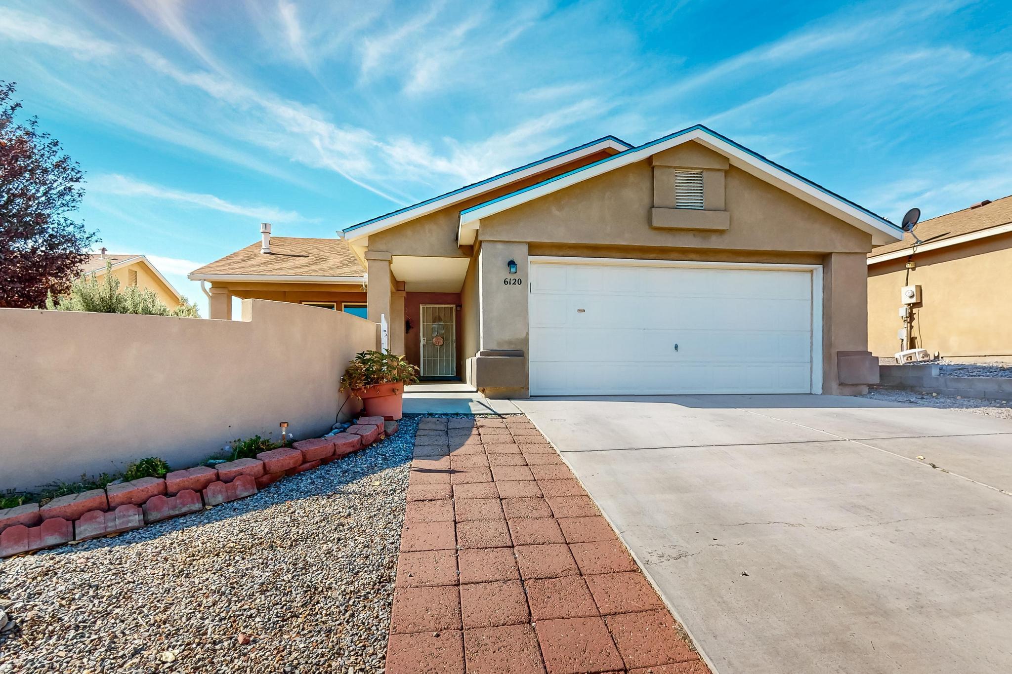 Welcome to this beautifully maintained 2-story, basement-style home with 2,300 sq. ft. of living space, featuring 3 to 4 large bedrooms. Recent upgrades include a new AC, furnace, and water heater, plus an irrigated grass backyard. The open layout offers vaulted ceilings, fresh paint, and tile flooring throughout the living, dining, and kitchen areas. Relax by the fireplace or convert the family room into a 4th bedroom. The master suite includes a garden tub, separate shower, and a large walk-in closet. Located in a great community, this home is ready to be yours. Schedule your showing today!