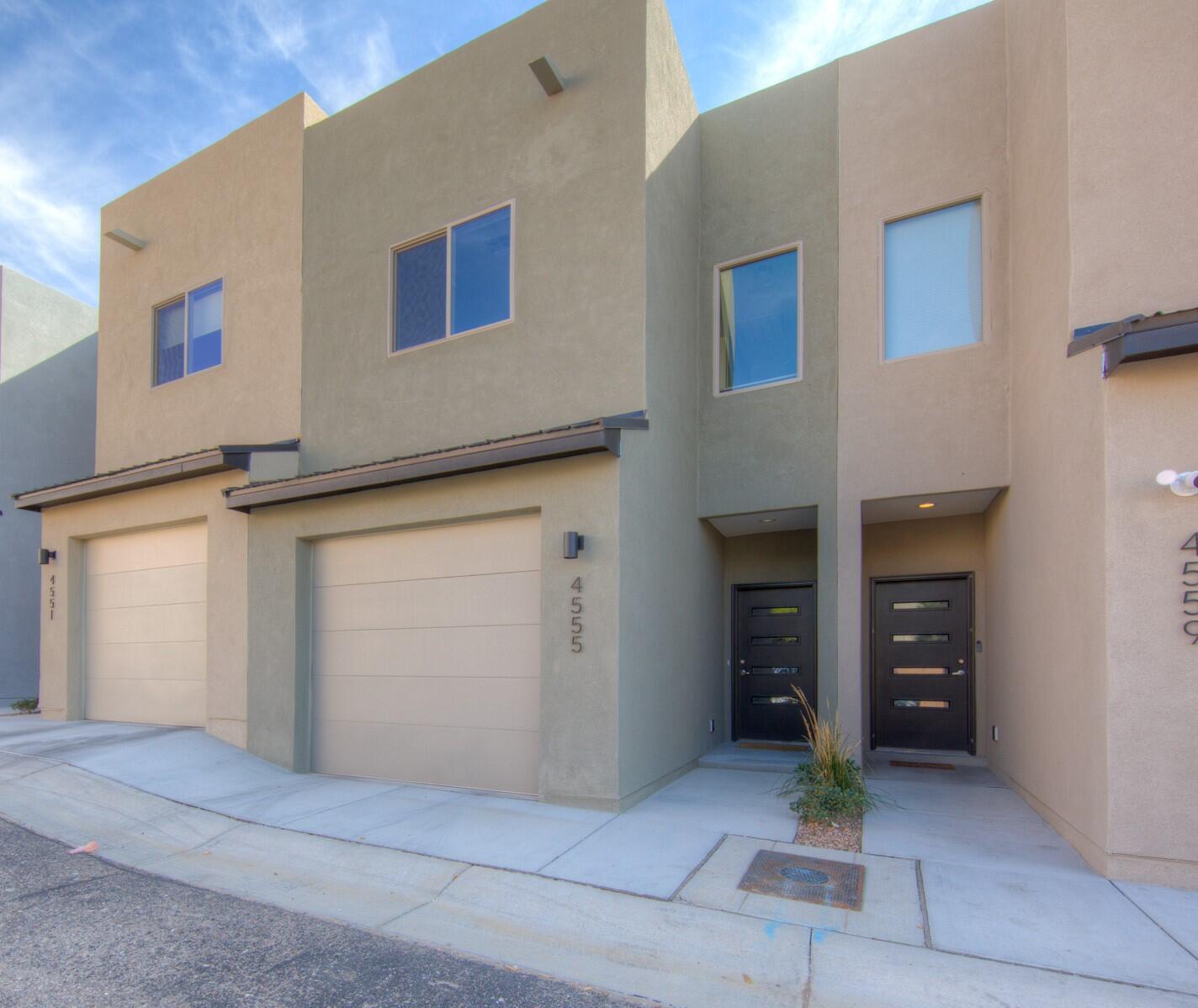 Immaculate Move-In Ready, NM Green Built Silver Certified Townhome in Desirable NE Heights! Downstairs Includes a Spacious Living Area, Half Bathroom, Patio, Under Stair Storage and a One Car Finished Garage! Beautiful Finishes Throughout with White Shaker Cabinets, LVT Flooring, Granite Counter Tops and the Kitchen has Stainless Steel Appliances!  This Home Offers Two Spacious and Separate Bedrooms! The Primary Suite Includes Double Sinks, Large Walk-in Shower, Large Closet and a Balcony. The Laundry Service Room is Conveniently Located Upstairs! This Townhome is Located in Close Proximity to the Base of the Sandia Mountains with Walking, Hiking and Biking Trails! Close to Shopping, Schools and Restaurants! A Must See!