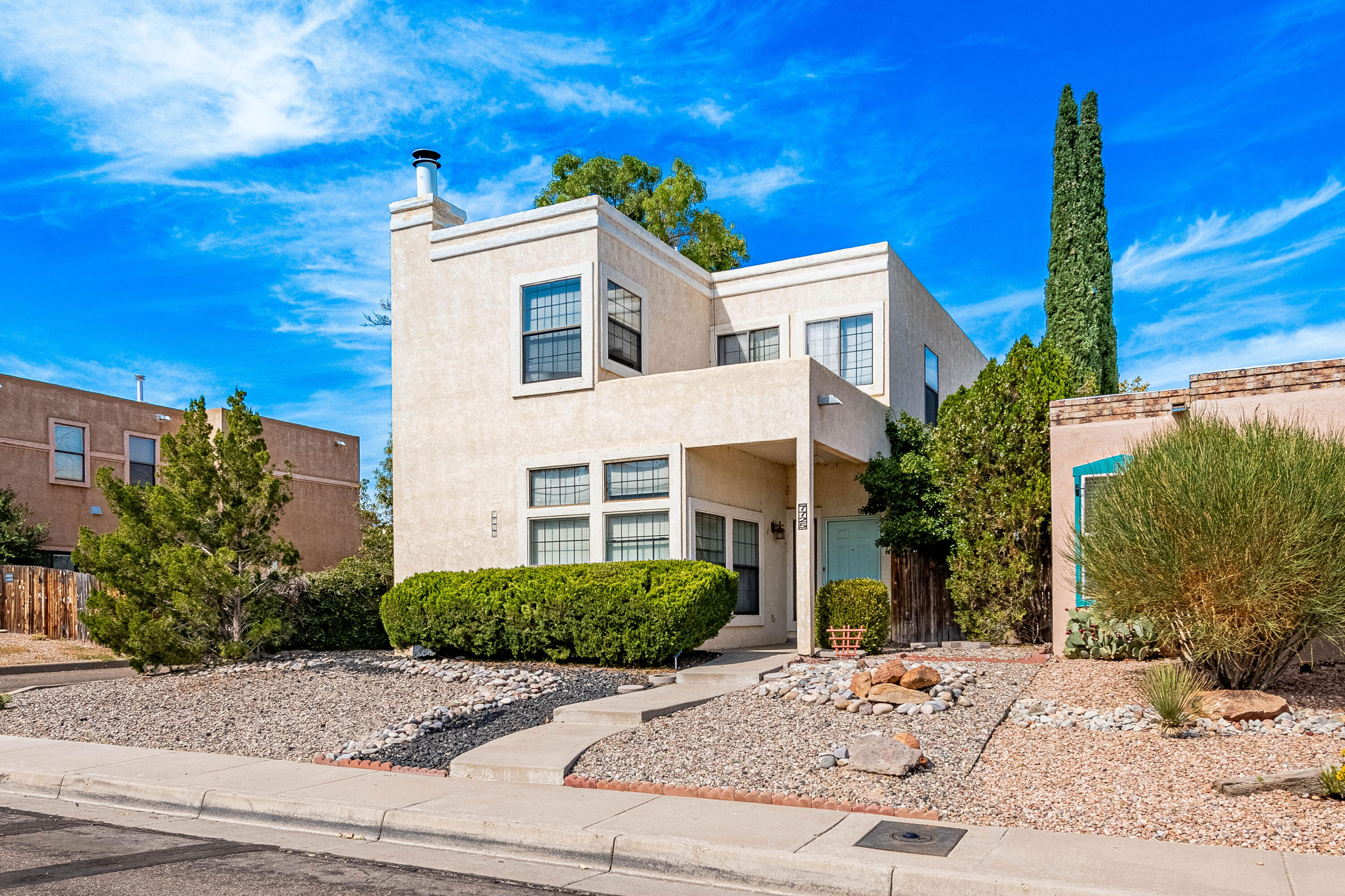 Nestled on a corner lot in a convenient northwest Albuquerque location, this charming 2-story home is filled with abundant natural light and features raised ceilings throughout. The spacious master bedroom offers a perfect retreat. Enjoy easy access to I-40, nearby schools, and a variety of local restaurants, making everyday living a breeze. Don't miss this opportunity to own a beautifully designed home in a great location!