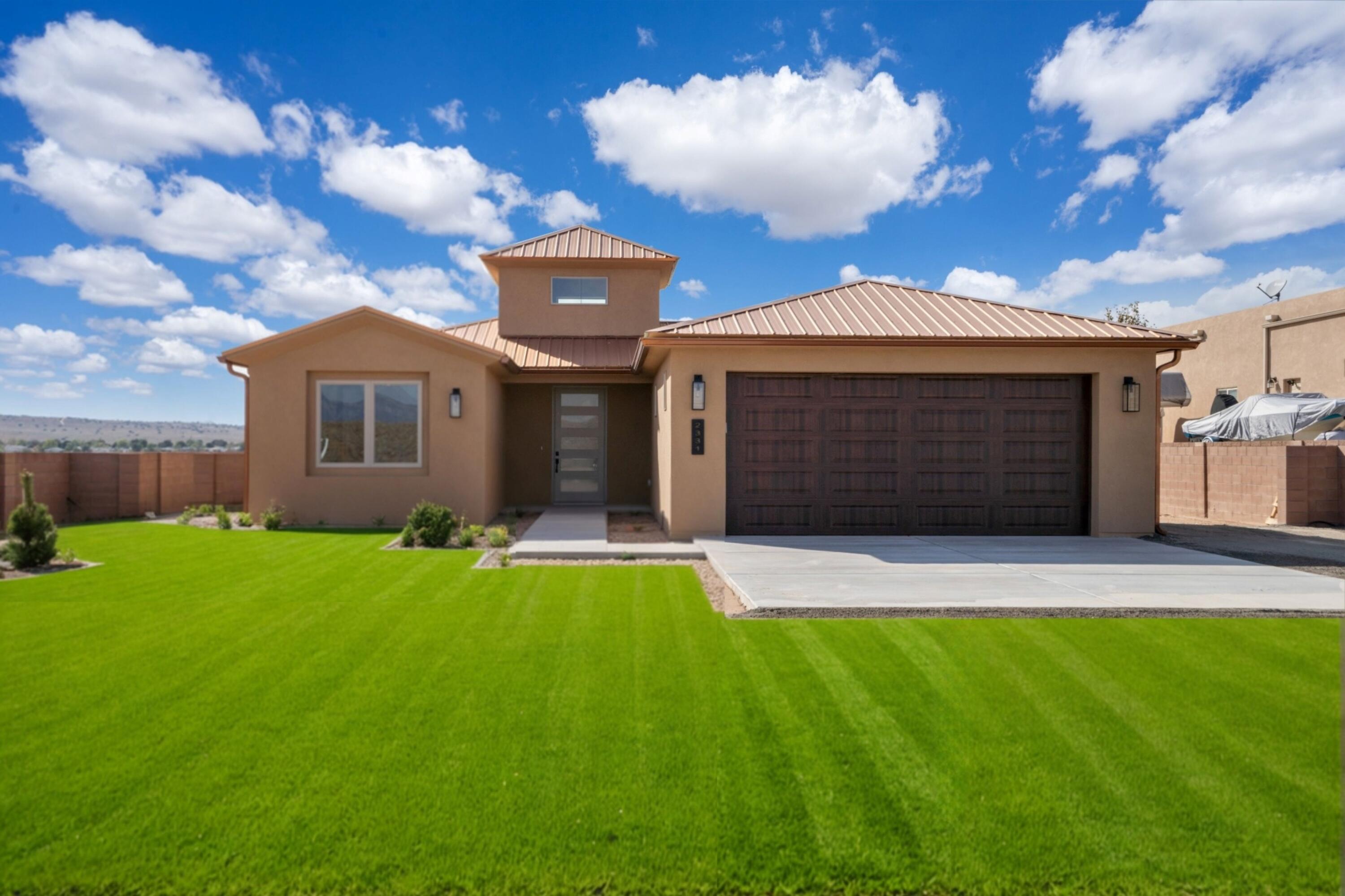 Brand new single-story home on a spacious half-acre lot in Rio Rancho! This stunning 4-bedroom, 3-bathroom home offers modern elegance with an open floor plan perfect for entertaining. The gourmet kitchen is a chef's dream, featuring high-end appliances, custom cabinetry, and a large center island. Cozy up by the fireplace in the living room or enjoy the privacy of the oversized backyard, perfect for outdoor living and future enhancements. The primary suite boasts a jaw-dropping, spa-like bathroom with luxurious finishes, creating a serene retreat. Move-in ready, this home is an incredible opportunity for buyers seeking new construction in a desirable location!