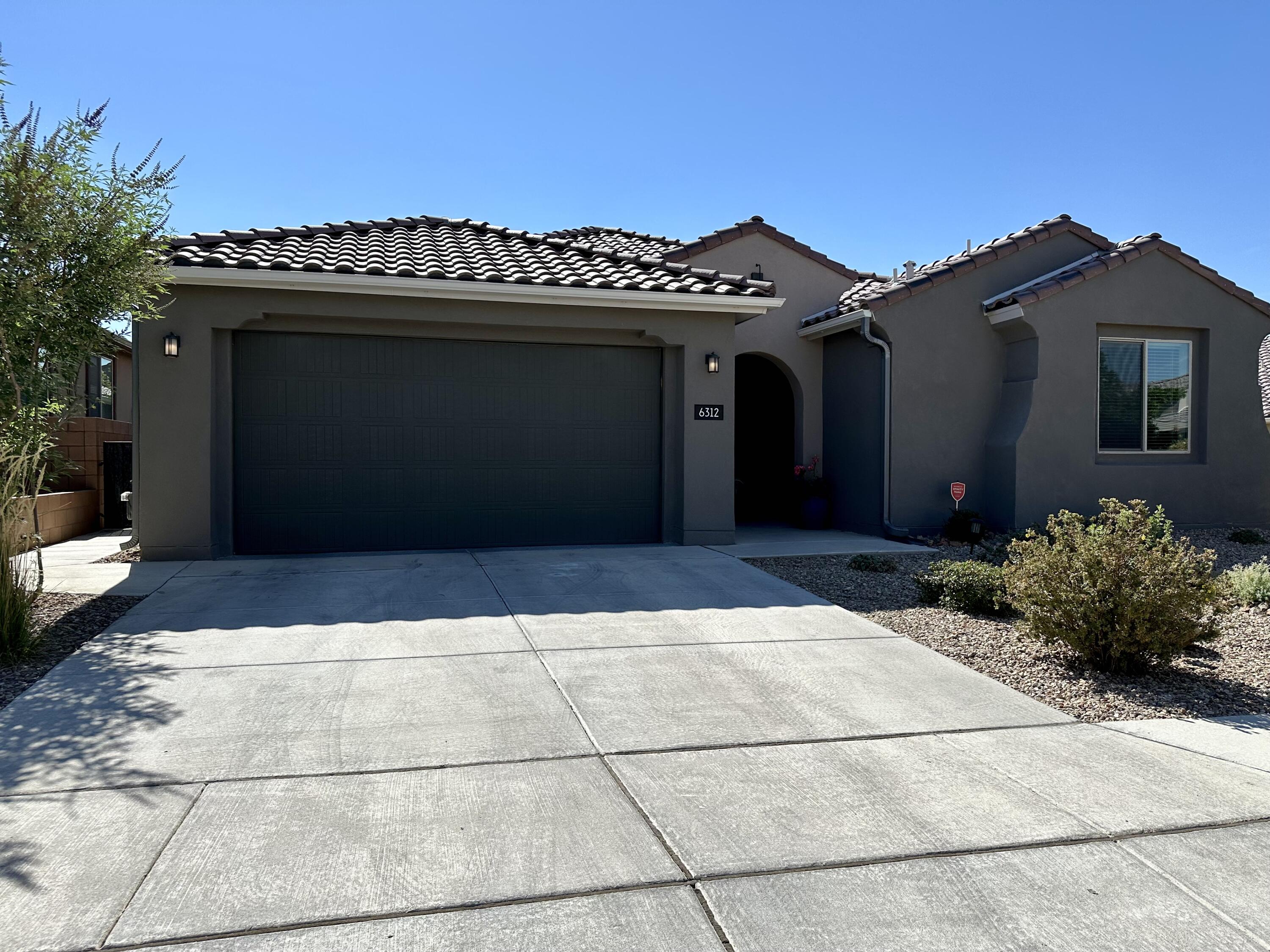 This single-story gem, built in 2019, offers a luxurious lifestyle in a highly sought-after gated community. With its open-concept layout, chef's kitchen, and expansive master suite, this home is perfect for entertaining and relaxation. Enjoy the benefits of owned solar panels and a three-car garage. The backyard oasis features a covered patio, fireplace, and hot tub. Don't miss this opportunity to own a beautiful, modern home!