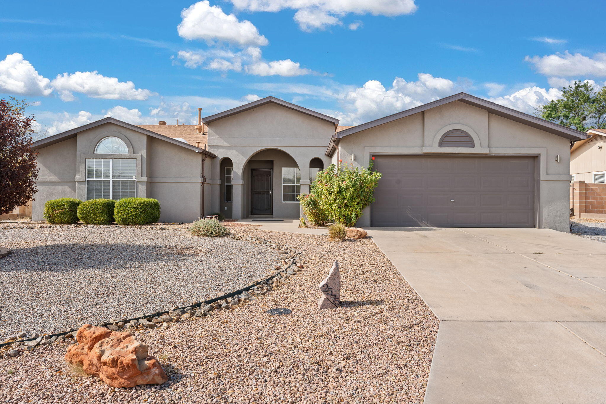 Situated on a huge .28 acre lot and just walking distance from the bosque, this gorgeous Rivers Edge home boasts a ton of natural light with a very functional floorplan! Home features a spacious layout with kitchen opening up to second living area and a large primary bedroom featuring  double sinks and closets in the bathroom suite. Newer roof (2018), pex plumbing, refrigerated air & new water heater make this home a wonderful value! Yard is xeriscaped for low maintenance and includes covered patio and backyard access/RV parking. Extended two car garage w/ storage & workshop area make this an unbeatable deal! Home needs a little TLC so is PRICED BELOW COMPS. Sellers also offering a $5000 allowance for paint/flooring! Check this one out before it's gone!