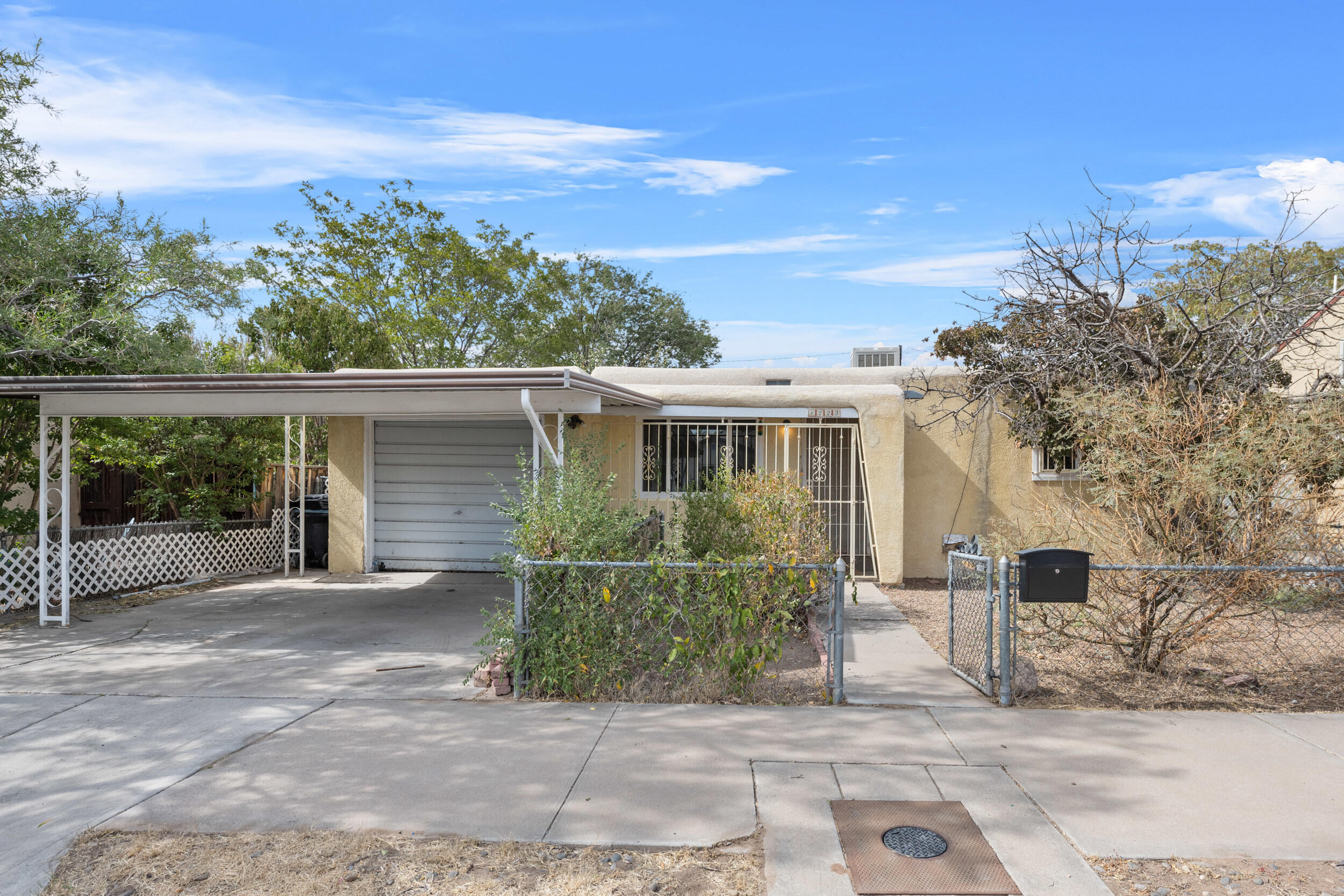 Charming 2-Bedroom Home in Downtown Albuquerque!Welcome to this beautifully updated 2-bedroom, 1-bathroom home in the heart of downtown Albuquerque! This cozy residence boasts a durable metal roof, a convenient one-car garage, and a handy storage shed, perfect for all your needs. Step inside to find fresh paint throughout, brand-new carpet, and newly installed countertops and appliances, all completed in October 2024. Enjoy the perfect blend of modern updates and classic charm in a prime location close to shops, dining, and local attractions. Don't miss out on this move-in ready gem!--