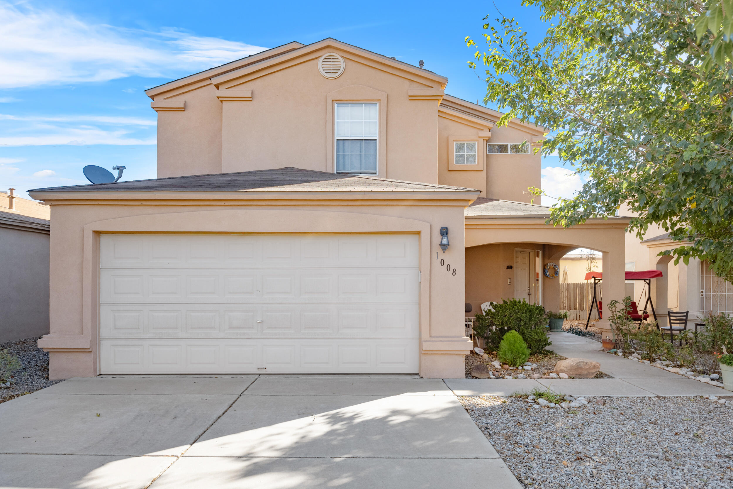 Welcome to this charming 3 bedroom, 2. 5 bath home in Albuquerque's desirable southwest neighborhood. The tiled first floor offers a seamless flow throughout the living spaces, while the cozy fireplace creates a warm and inviting atmosphere. Enjoy an open floor plan that's perfect for entertaining and gatherings. The backyard provides ample room for outdoor activities and relaxation. With convenient access to local amenities, this home is ideal for any buyer!  Don't miss your chance to make it your own!