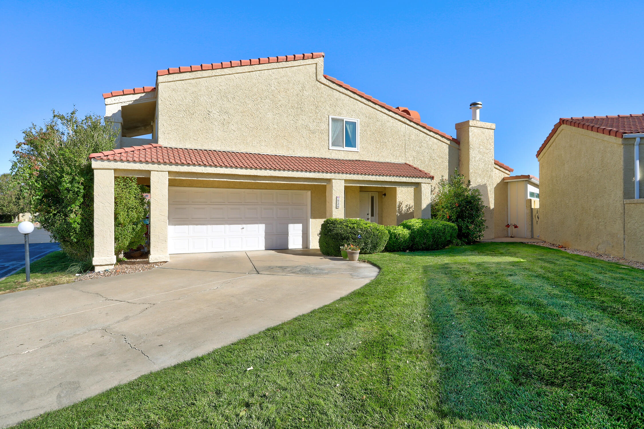 This well-maintained townhome in a serene 55+ community offers a comfortable, open layout perfect for easy living. On the main floor, you'll find a welcoming living room, dining area, and kitchen along with a convenient half bath for guests. A highlight of the home is the spacious sunroom at the back, filled with natural light and leading directly to a grassy oasis ideal for relaxing or enjoying morning coffee. Upstairs, there are two bedrooms, each with its own full bathroom, providing comfort and privacy for both residents and guests. The primary bedroom also includes a large closet and additional storage space. The Primary also features a large balcony that was recently refinished. Painting allowance with acceptable offer. Come check out this beautiful home today!