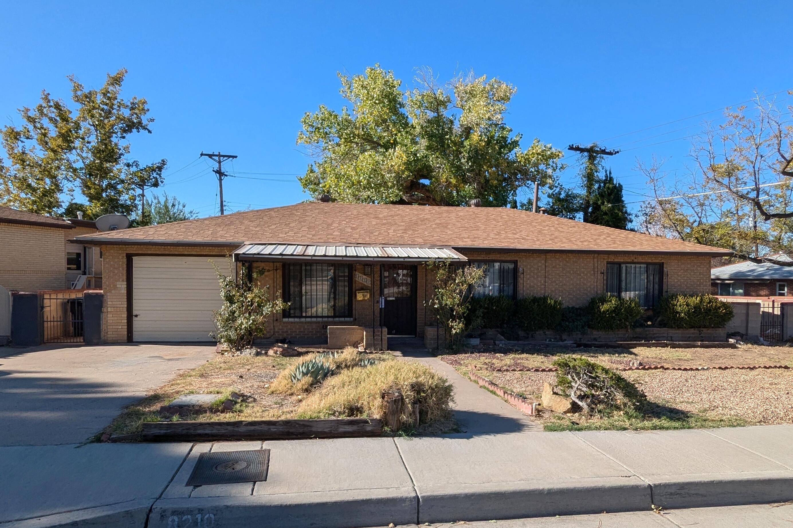 Located in an established Uptown neighborhood this lovely home has two large living areas including family room with kiva fireplace, dining room and kitchen with lots of cabinets. Three spacious bedrooms, two that share a jack and jill bath. Home has been recently painted, has all tile flooring and has newer furnace and evaporative cooler. Utility room has lots of builtin cabinets. Great location, home is within walkin distance of three parks, a library, restaurants and the Wyoming Mall and a short drive to Coronado and Winrock shopping centers. Also enjoy quick access to the freeway.