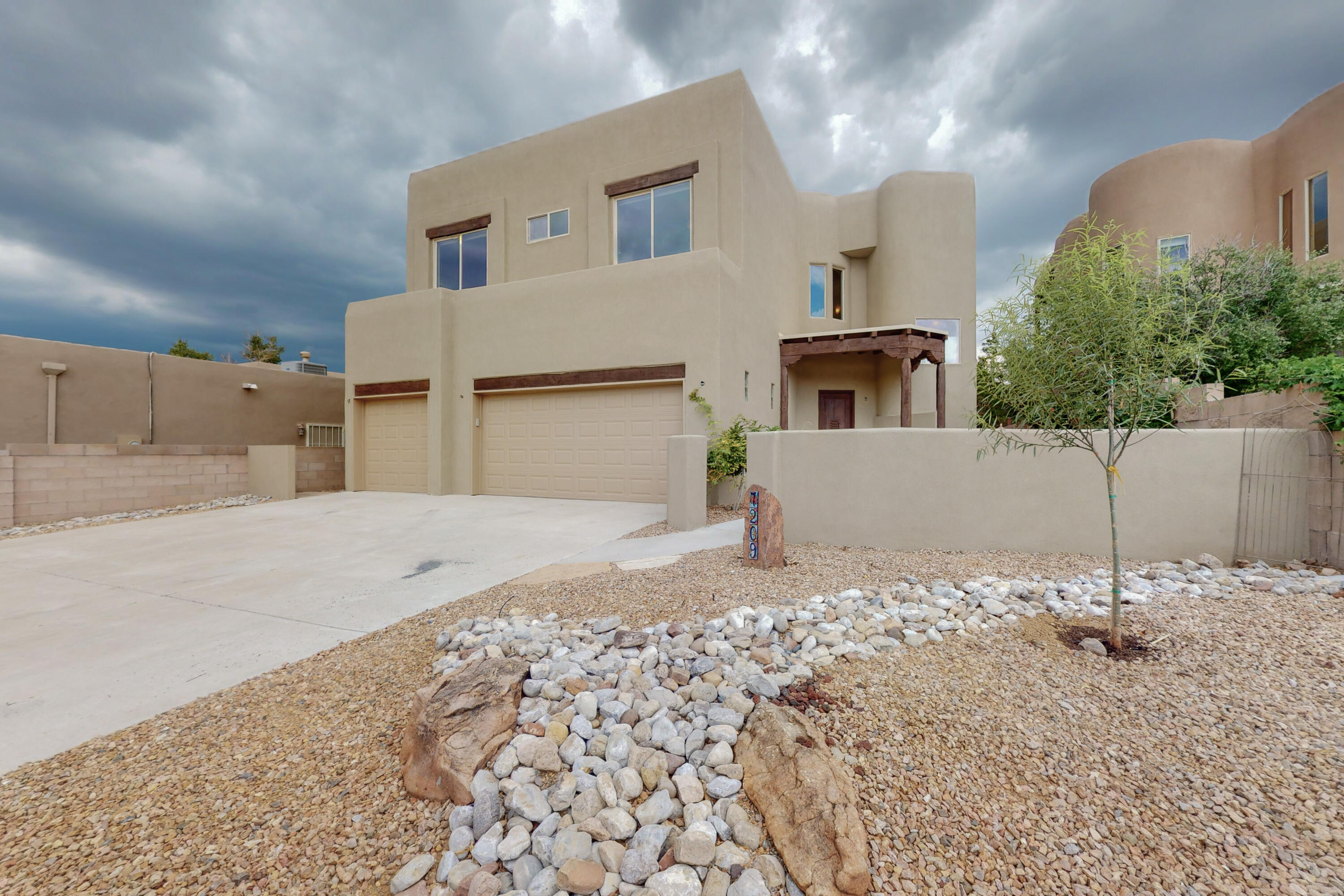 This a great home in Desert Ridge Trails South Subdivision.  New Stucco , New TPO Roof , New Paint, New Carpet, New Refrigerated AC Unit, New Backyard Landscaping, Epoxy 3 car Garage Finished and All this Backing up to Open Space with Sandia views.