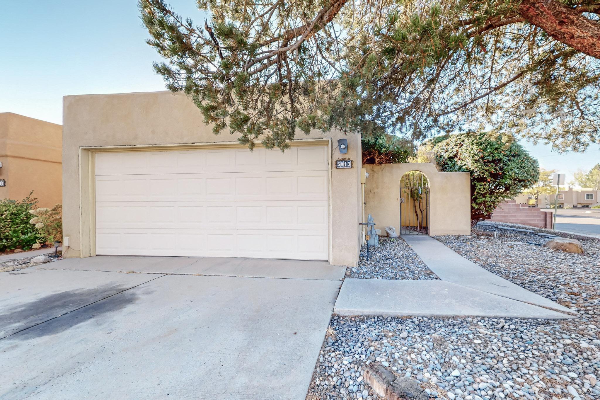Seller motivated. Desirable location in the Northeast Heights.  Great open concept layout with 2 bedrooms and 2 baths. Master bedroom has two closets. Courtyard entrance and quaint private backyard. Convenient location off Academy near Arroyo Del Oso golf course. Come take a look and bring your own special touches to make it your own!