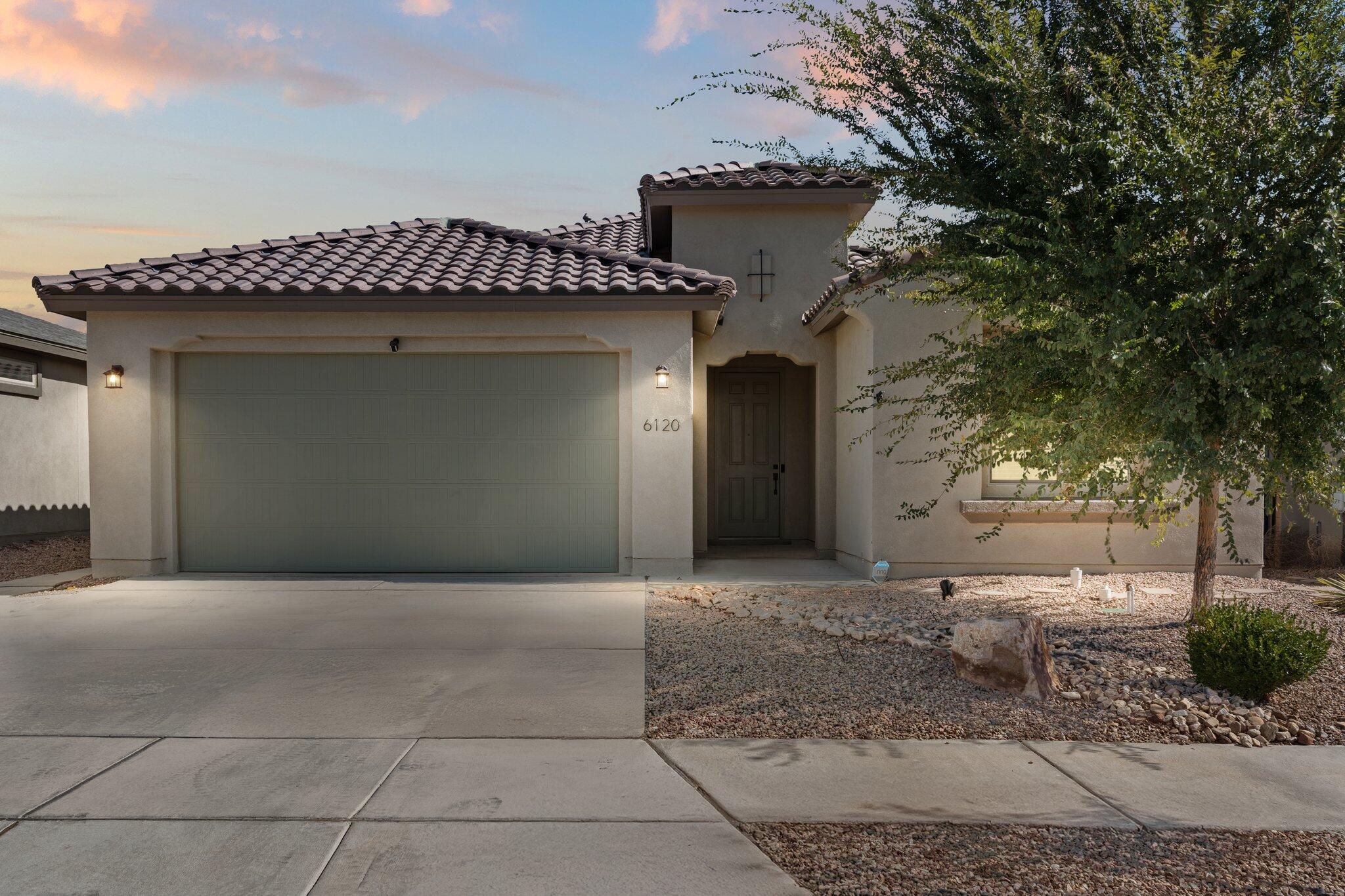 Experience the perfect blend of comfort and style in this stunning Pulte home in Mesa Del Sol! With an open design, this energy-efficient home features tile & carpet flooring, recessed & pendant lighting, and a cozy fireplace. The kitchen impresses with built-in appliances, a spacious island with bar seating, and effortless flow into the living area--perfect for hosting or daily life. Unwind in the primary suite, complete with a walk-in closet and an ensuite bathroom featuring a double sink vanity and walk-in shower. Outside, a private, walled backyard with a covered patio awaits, ideal for relaxation or entertaining. With a 2-car garage and dedicated laundry room, this home seamlessly blends style and practicality. Schedule your tour today to experience this exceptional home firsthand!