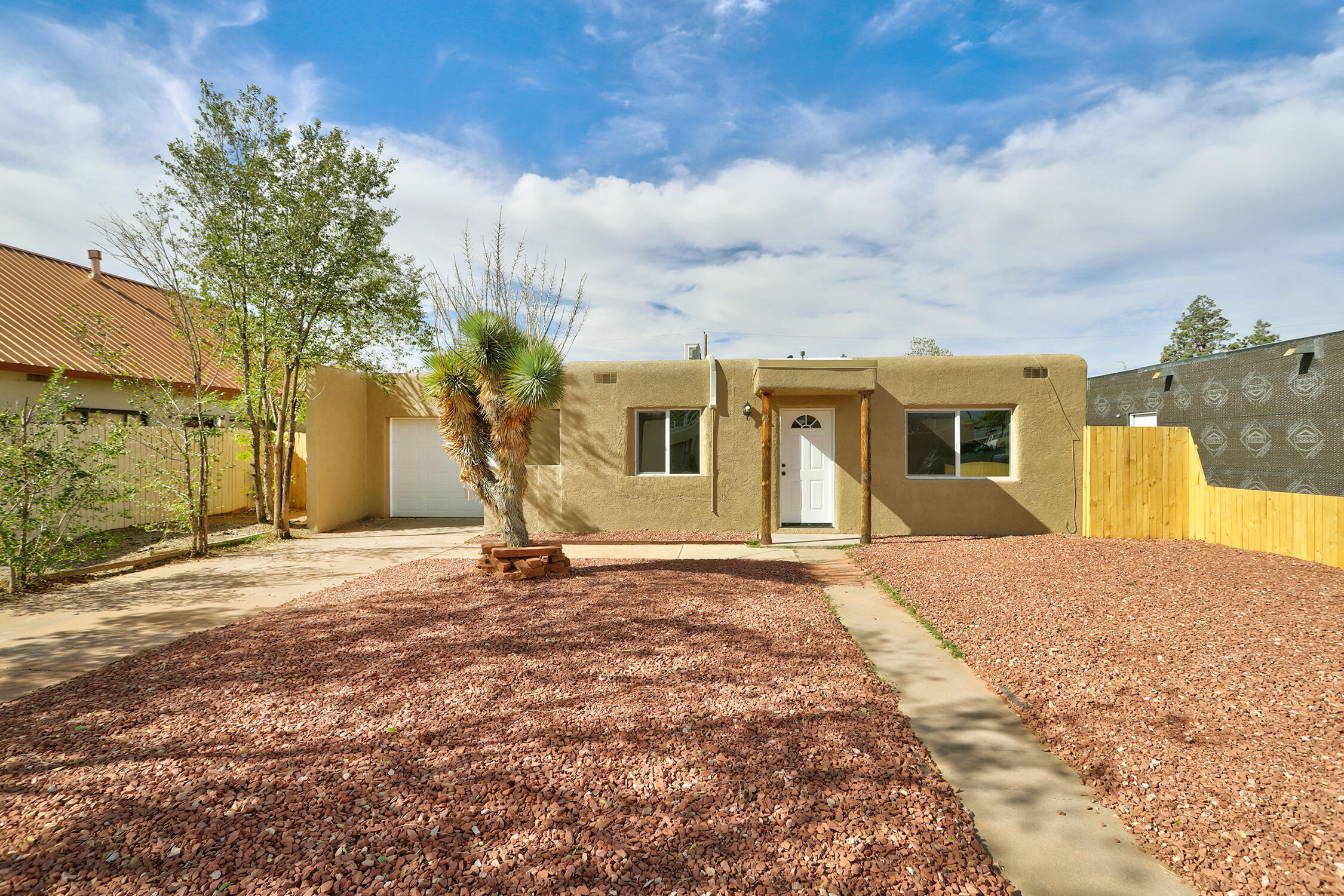 Nice 3 bedroom, 1 bath home, with oversized 1 car garage and spacious backyard with backyard access. Features new flooring, mini-splits, kitchen cabinets, stainless appliances, updated bathroom, new lights, fixtures, and fresh interior paint.